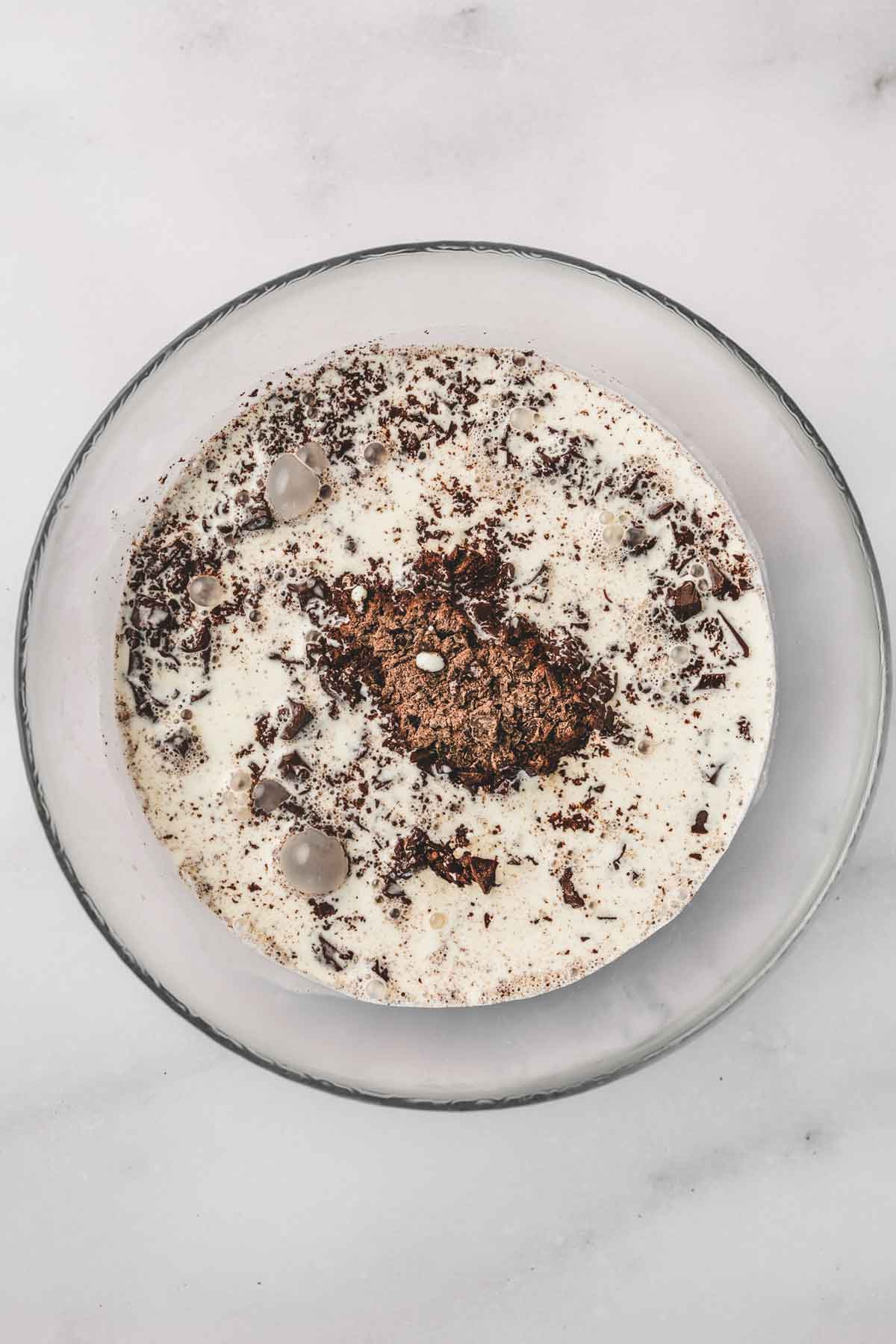 medium bowl with hot cream and chopped chocolate