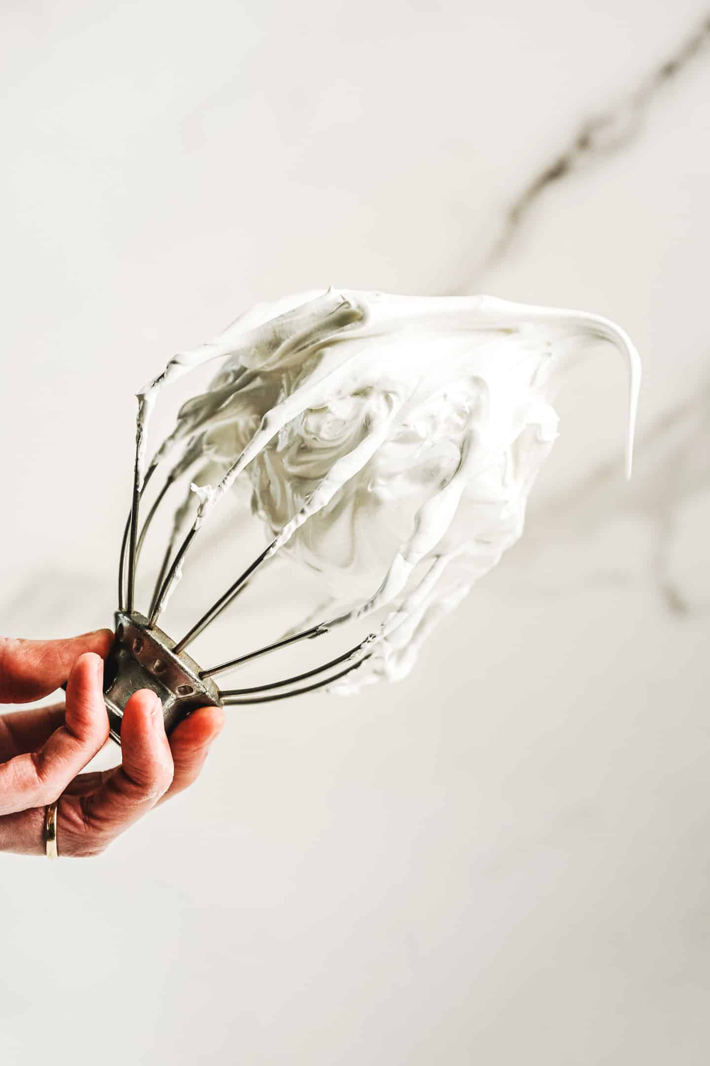 whisk with swiss meringue