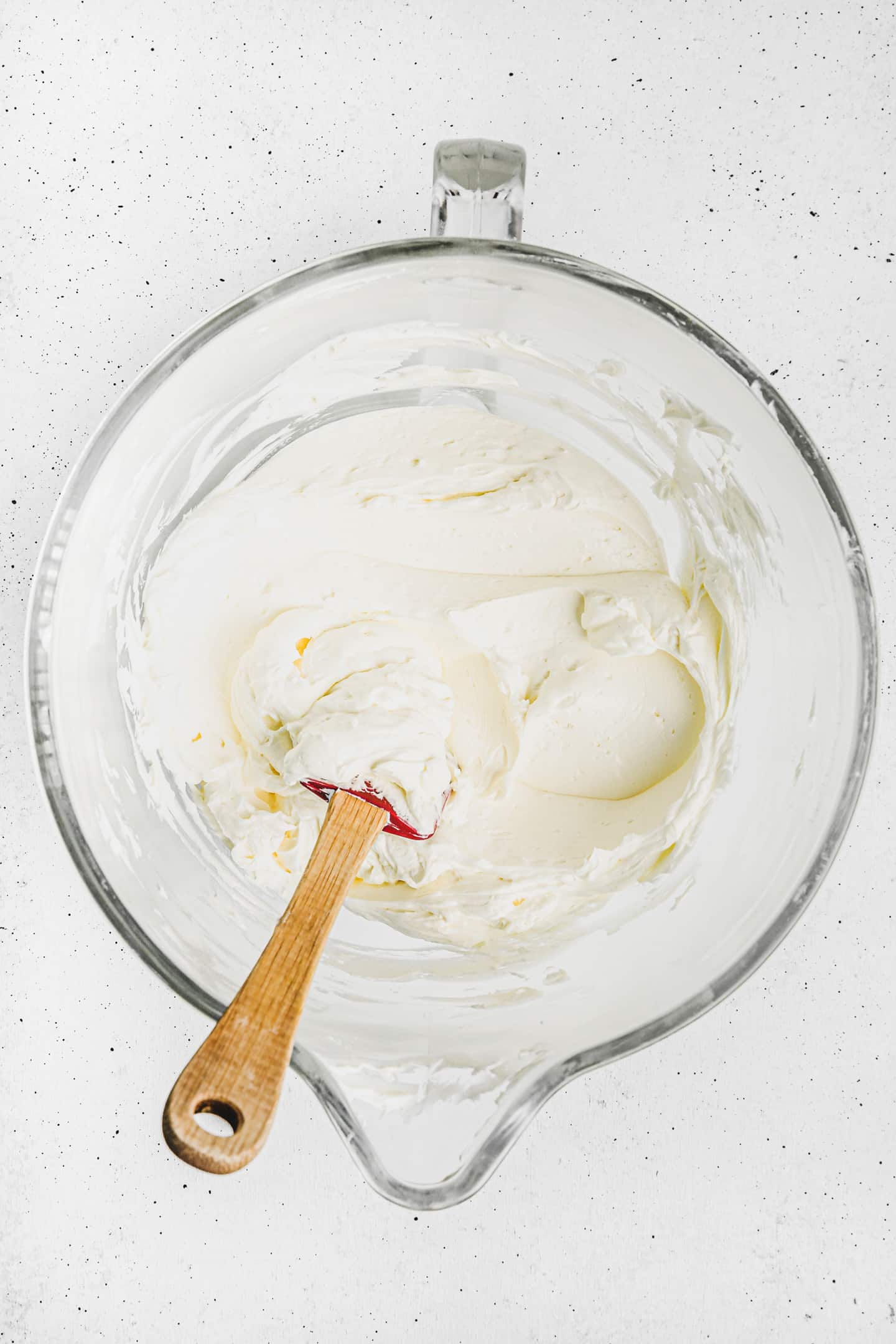 large mixing bowl with vanilla buttercream