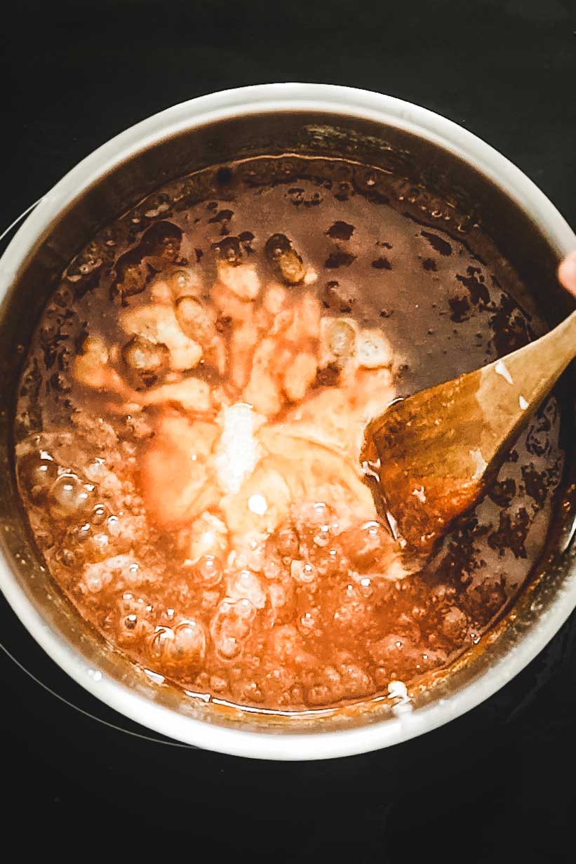 saucepan with caramel sauce 