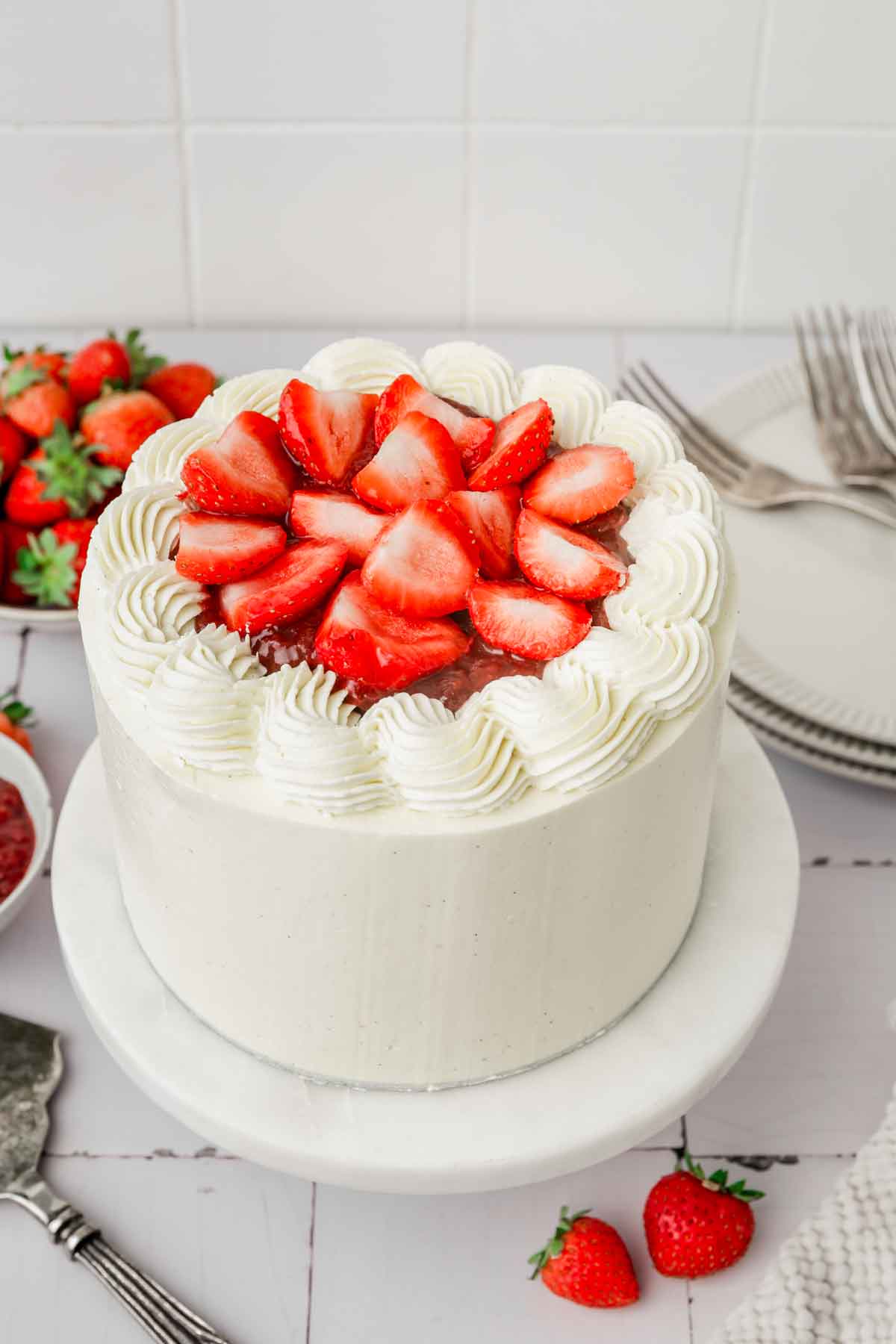 vanilla cake with fresh strwberries on top
