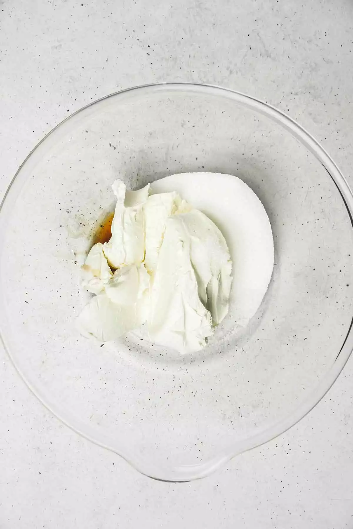 Large bowl with cream cheese sugar and vanilla