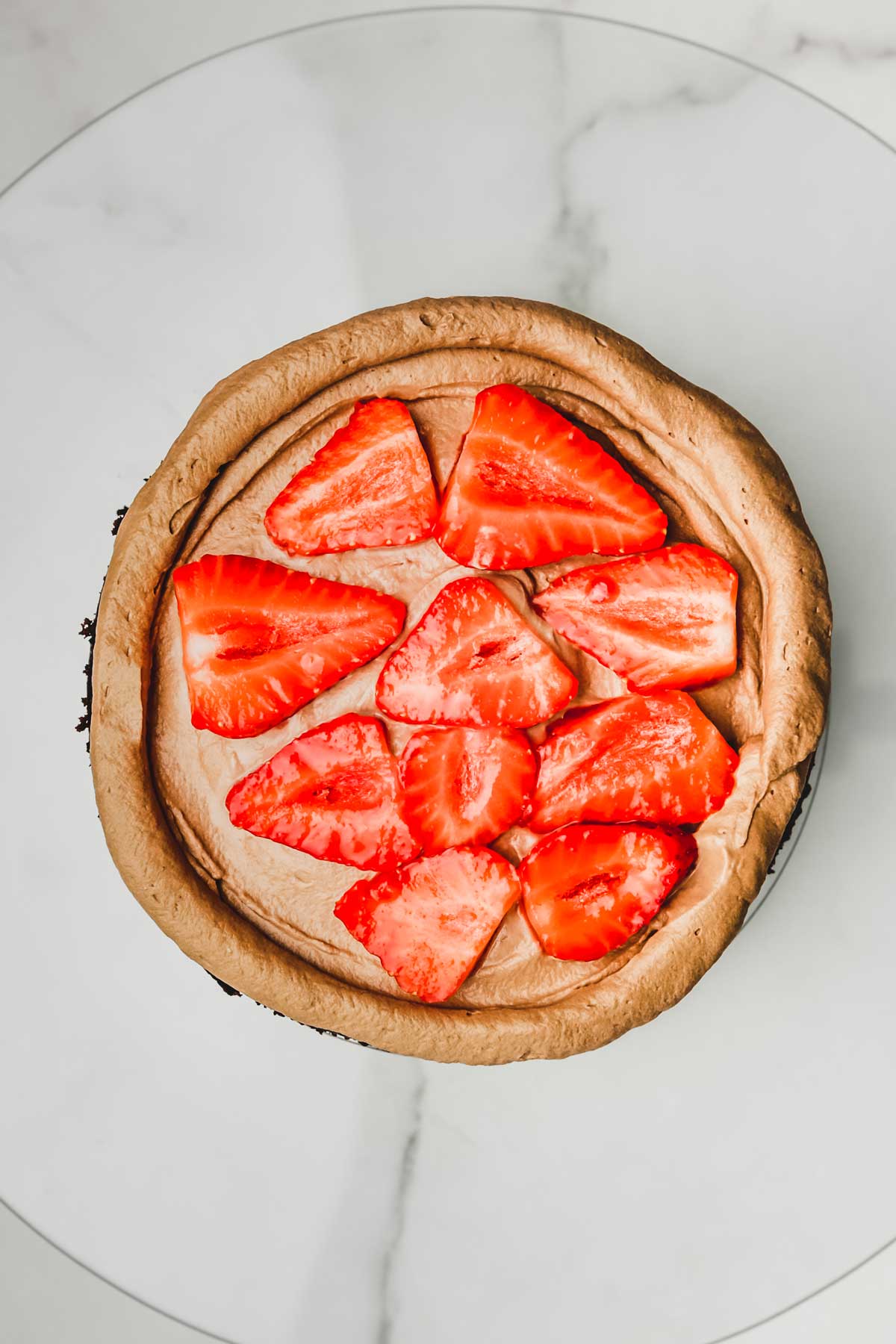 Chocolate sponge cake layered with ganache and fresh strawberries