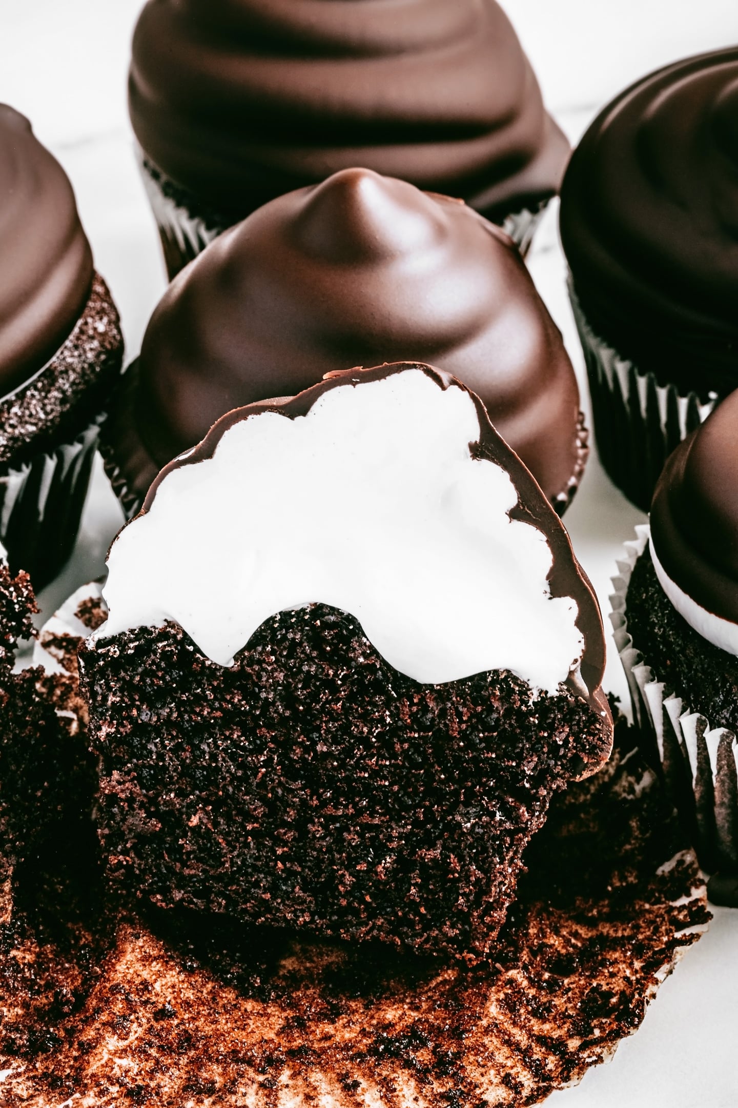 cupcake with marshmallow frosting and chocolat shell