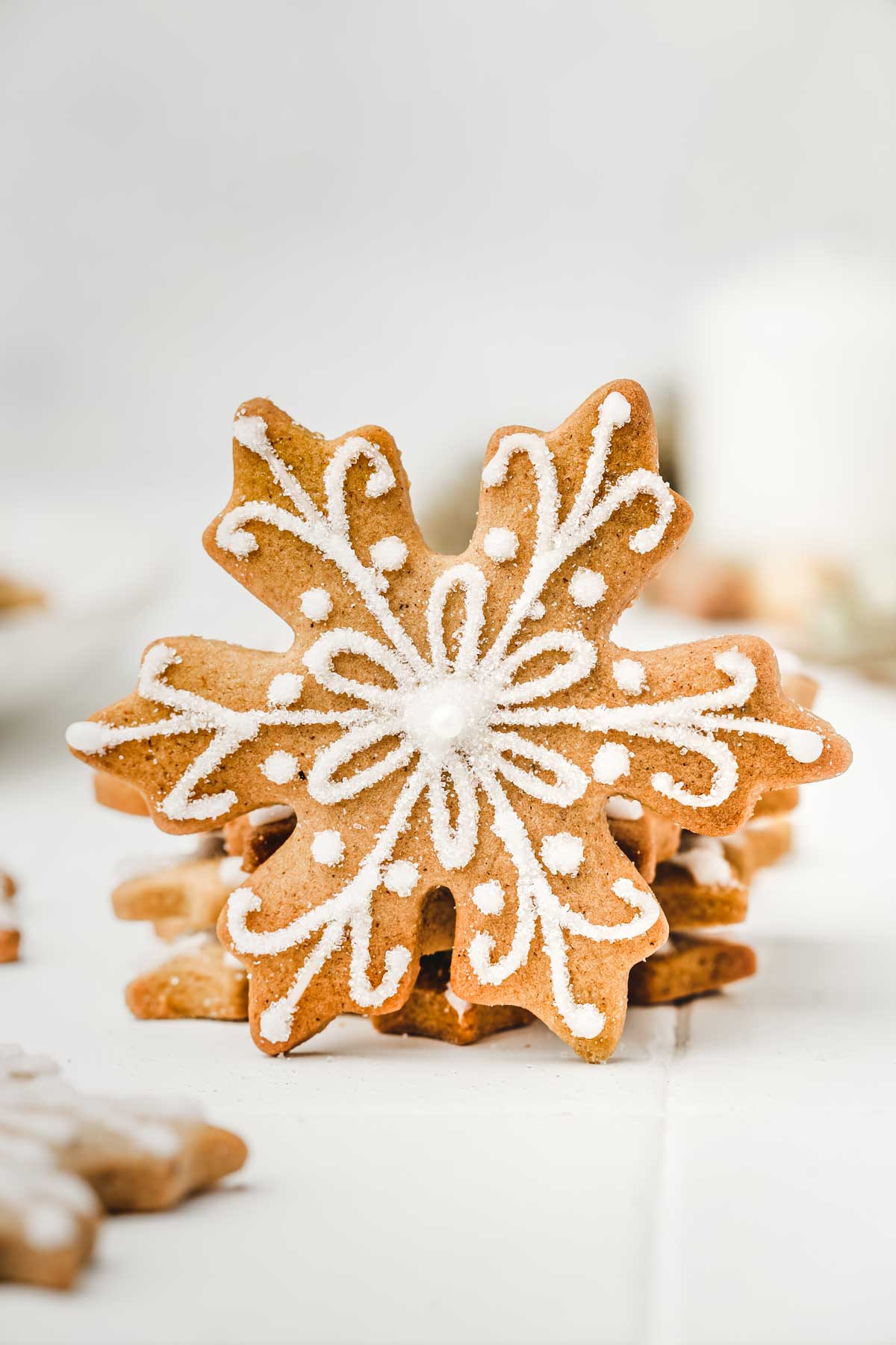 One snowflake cookie on a table