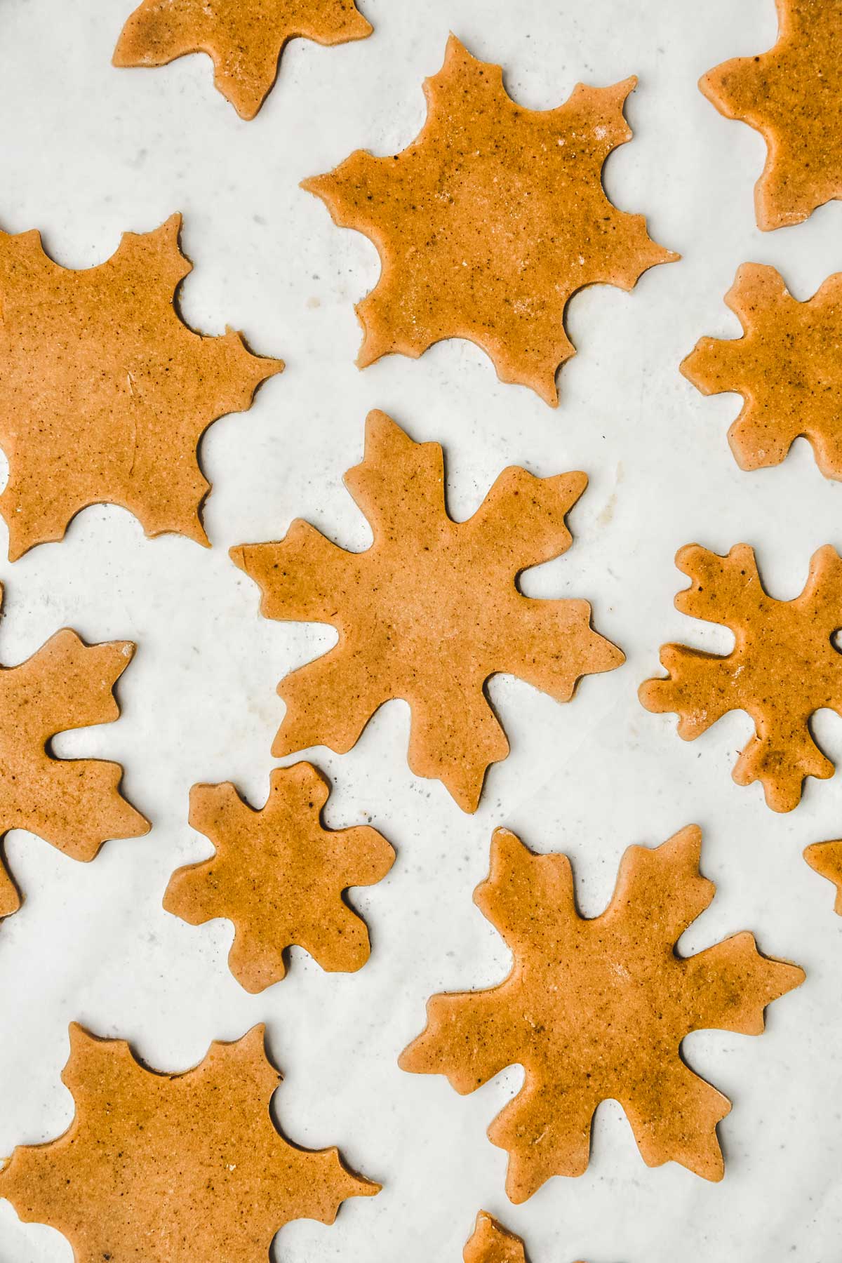 Cut out snowflake cookie dough