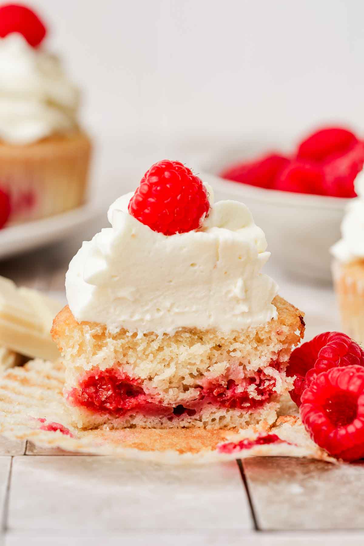 sliced cupcakes with fresh raspberries