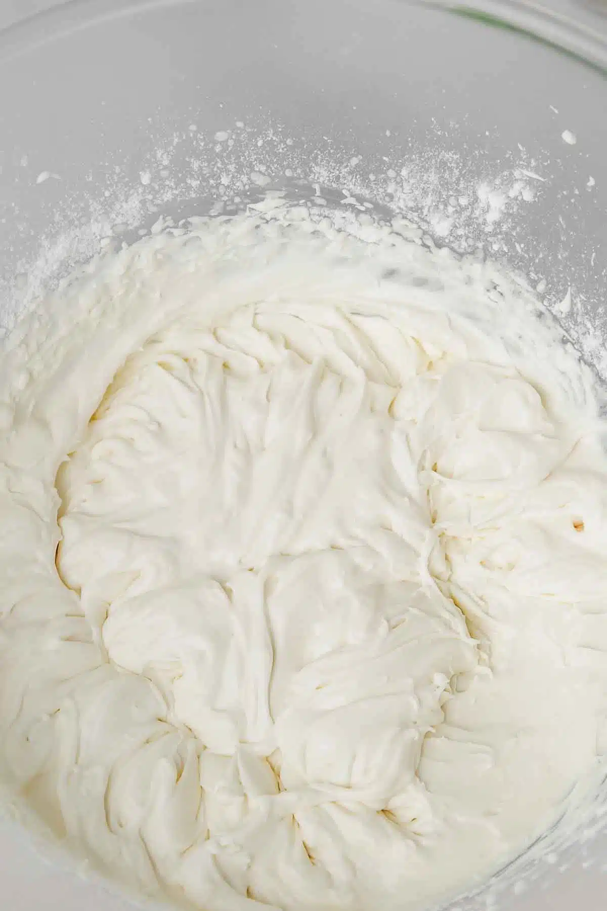 mixing bowl with whipped cream 