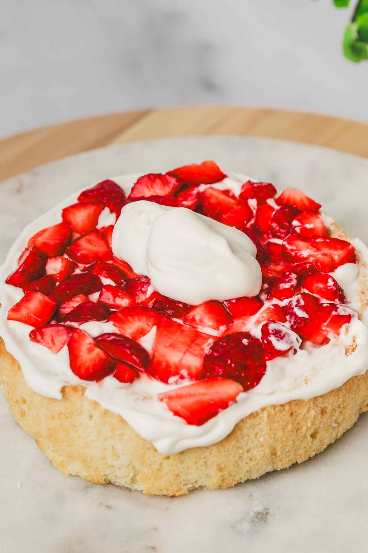 Chiffon cake layer filled with whipped cream and fresh strawberries