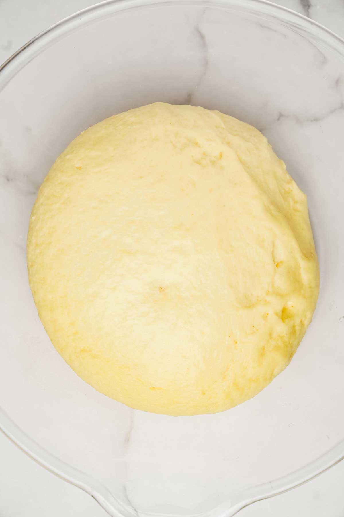 brioche dough in a bowl