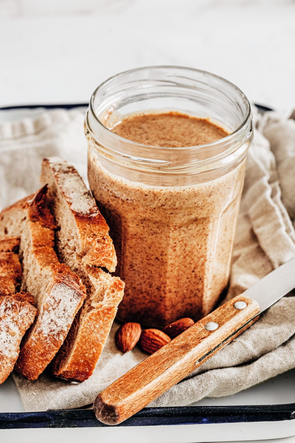 almond butter on a plate with bread