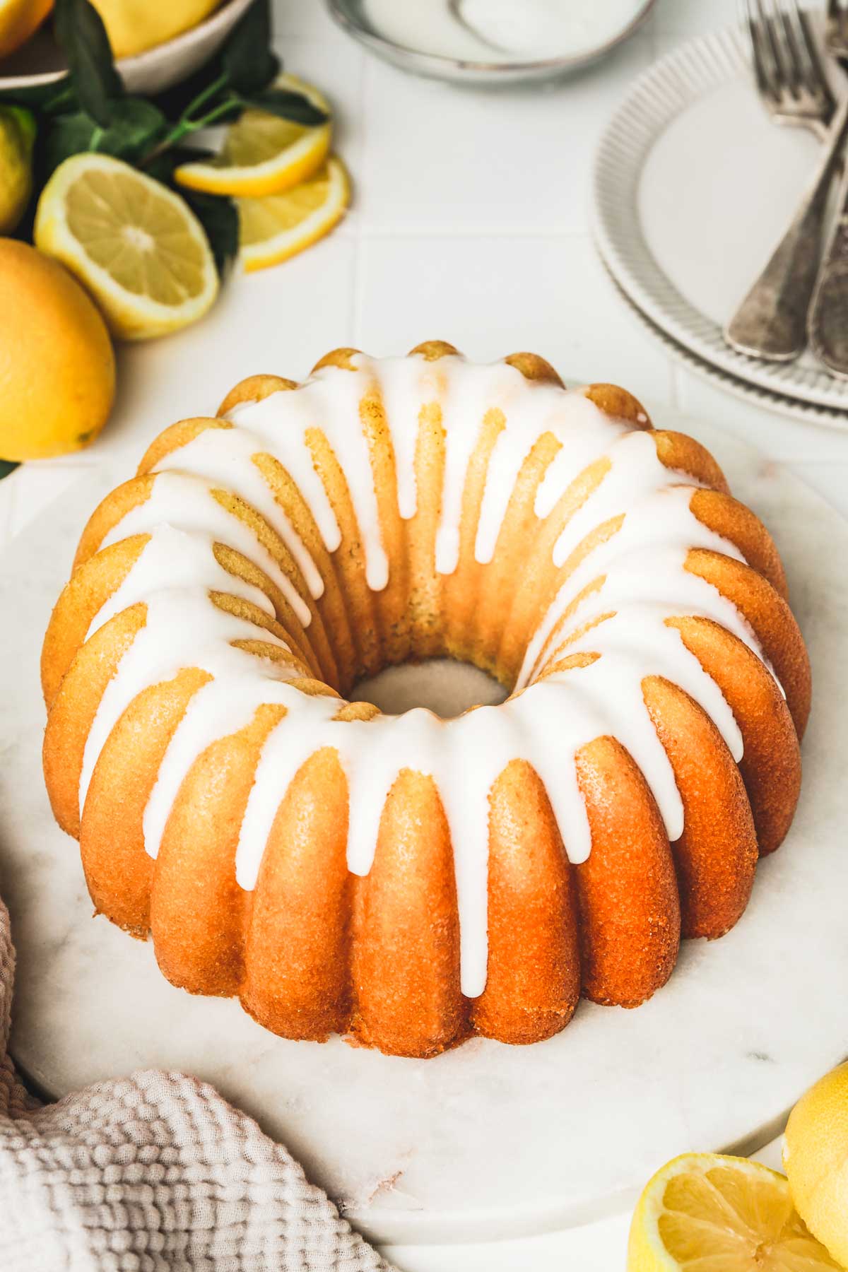 Lemon bundt cake on a table with a lemon glaze