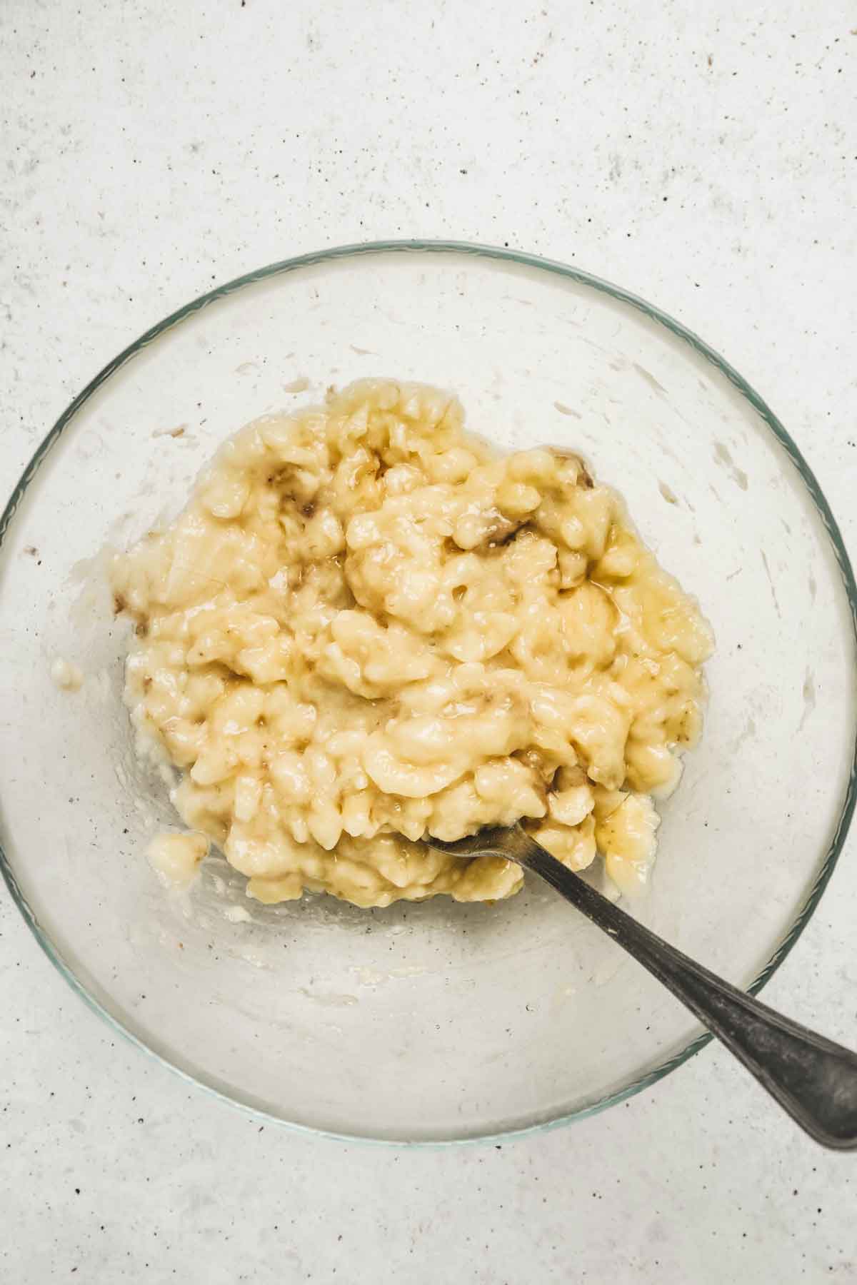 Large bowl with mashed bananas