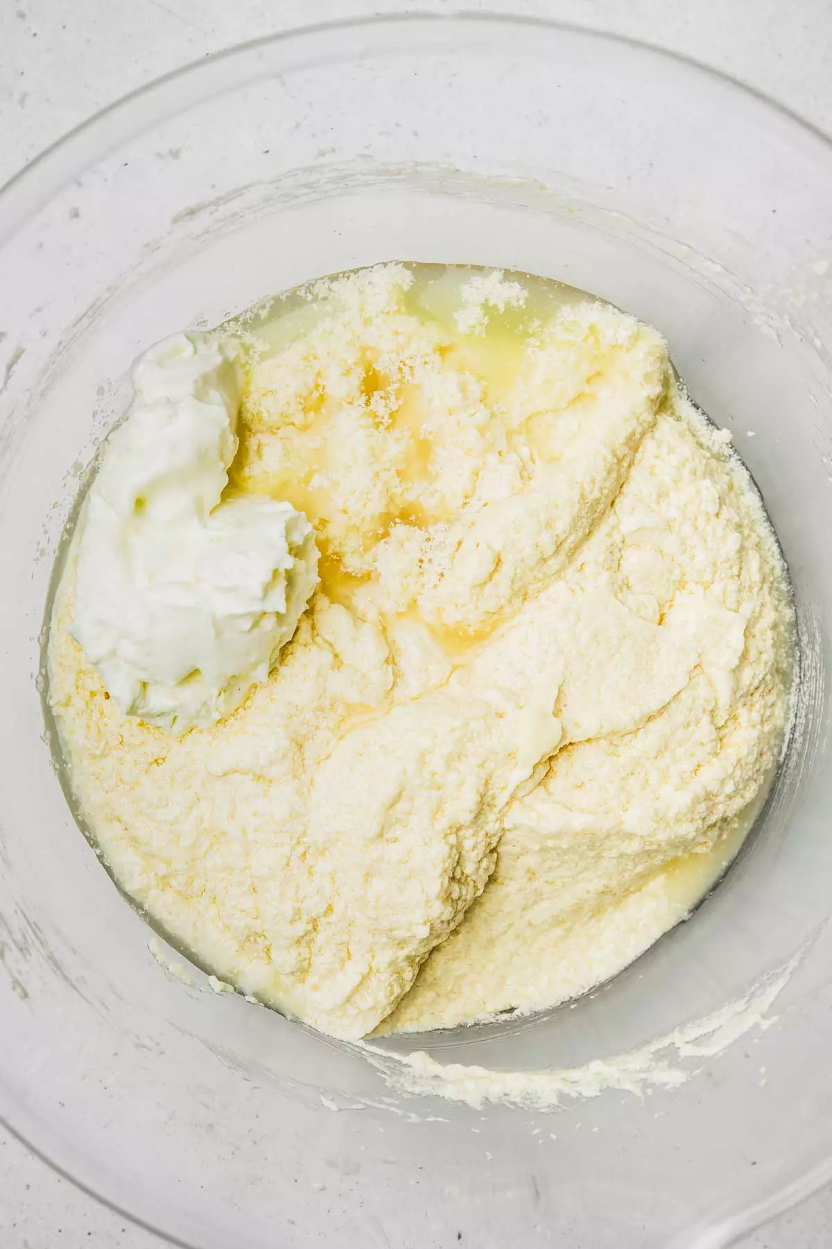 lemon loaf cake batter in mixing bowl