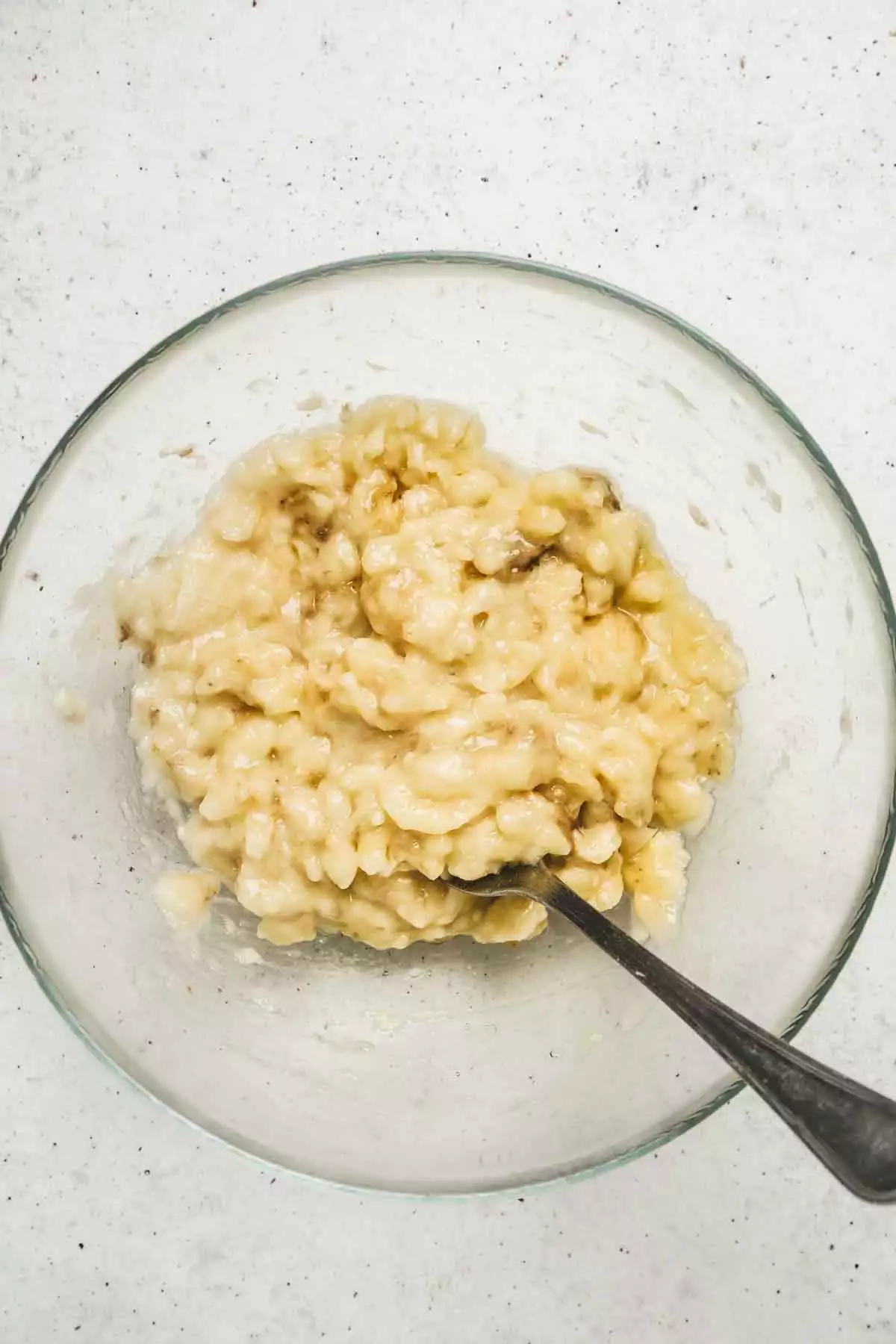 Large bowl with mashed bananas