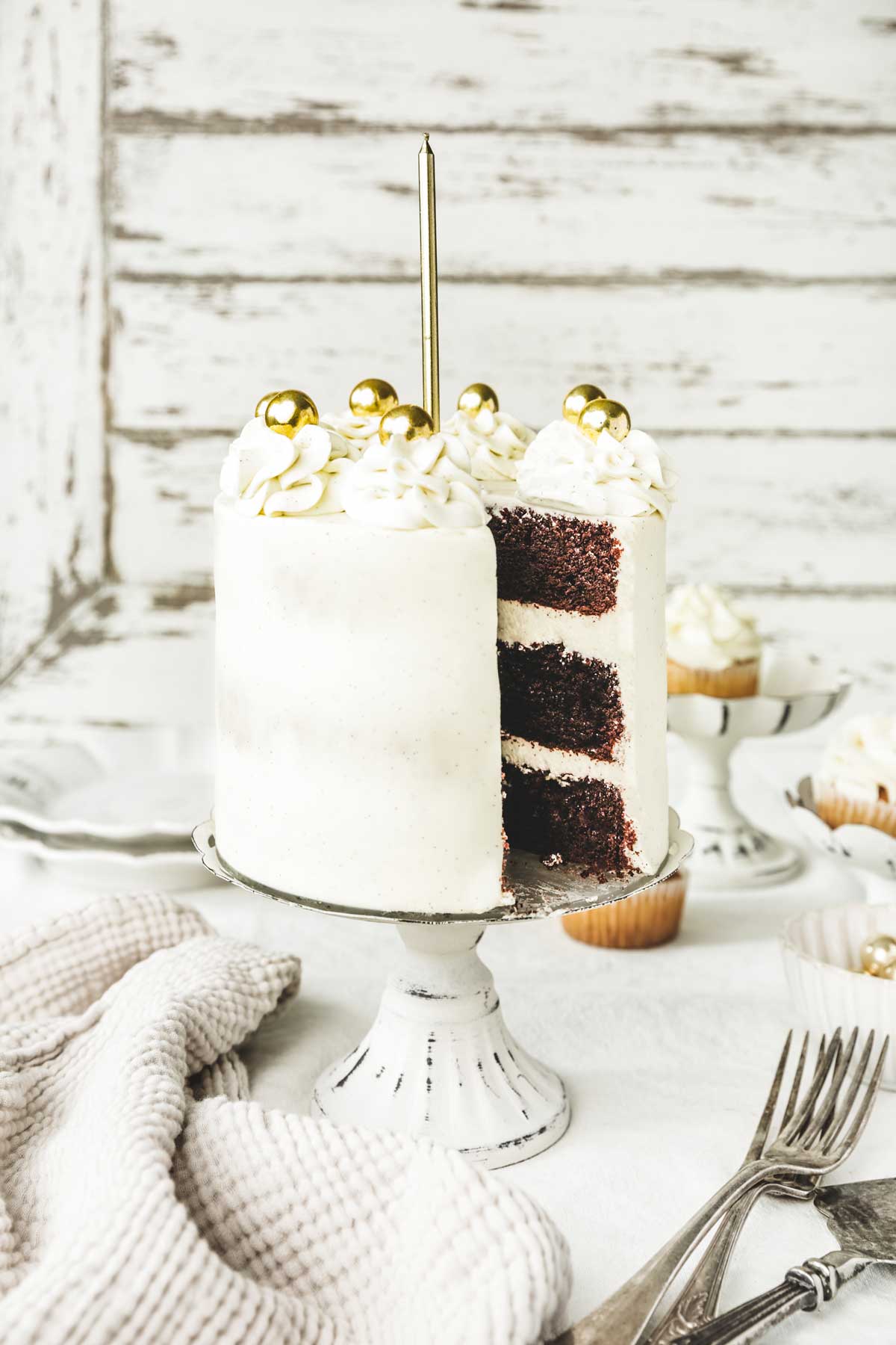 vanilla chocolate cake on a cake stand