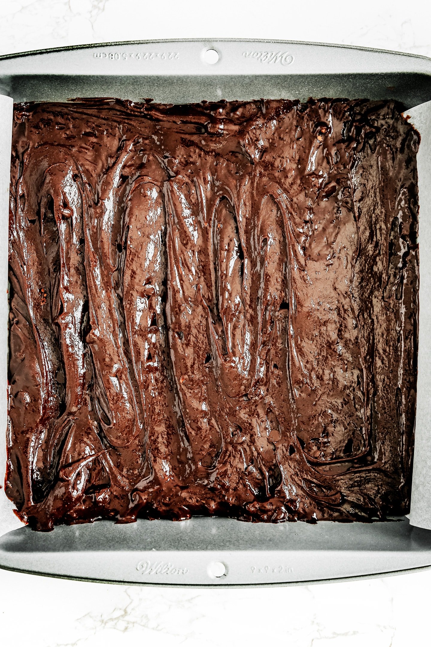 square cake pan with brownie batter