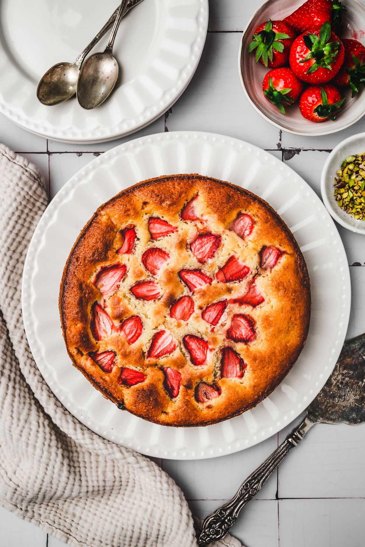 large plate with a strawberry coffee cake