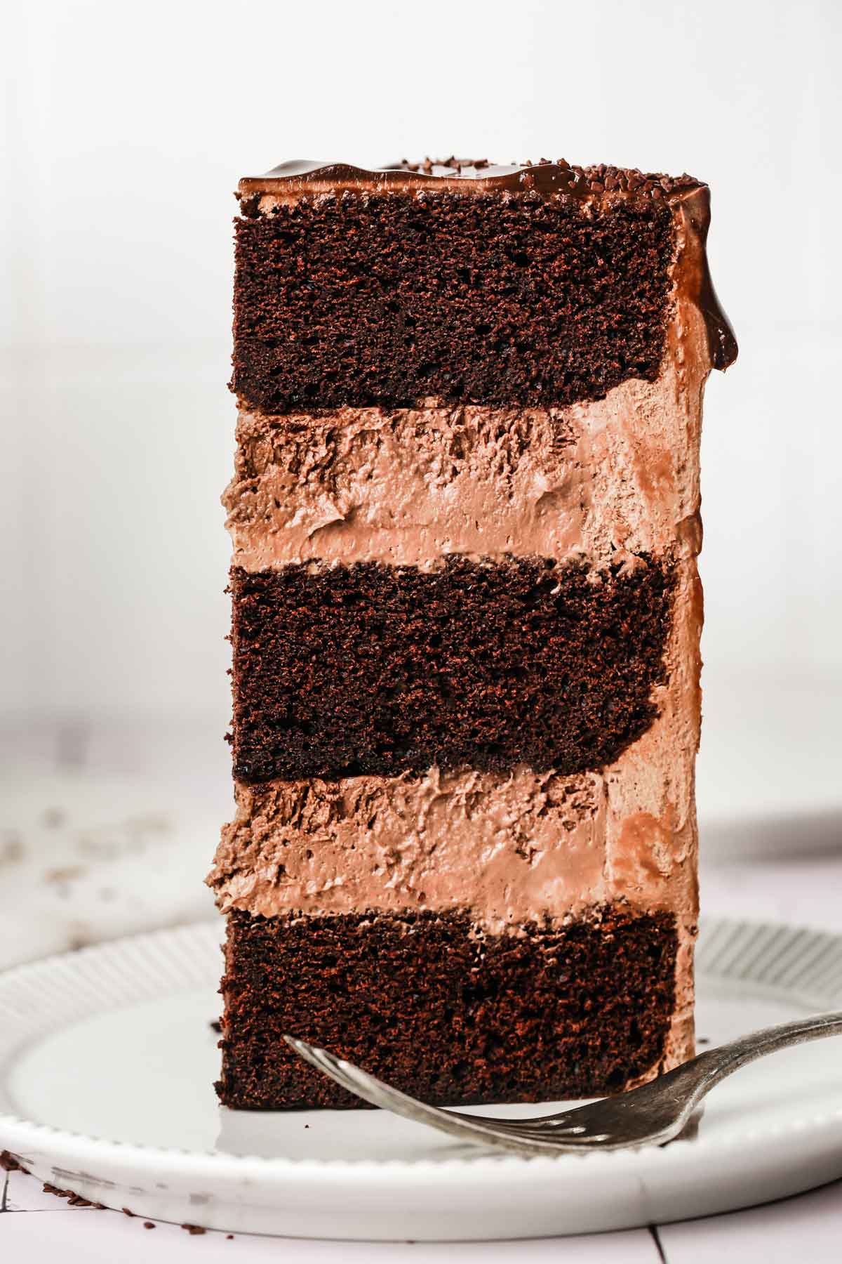 sliced chocolate ganache cremeux cake