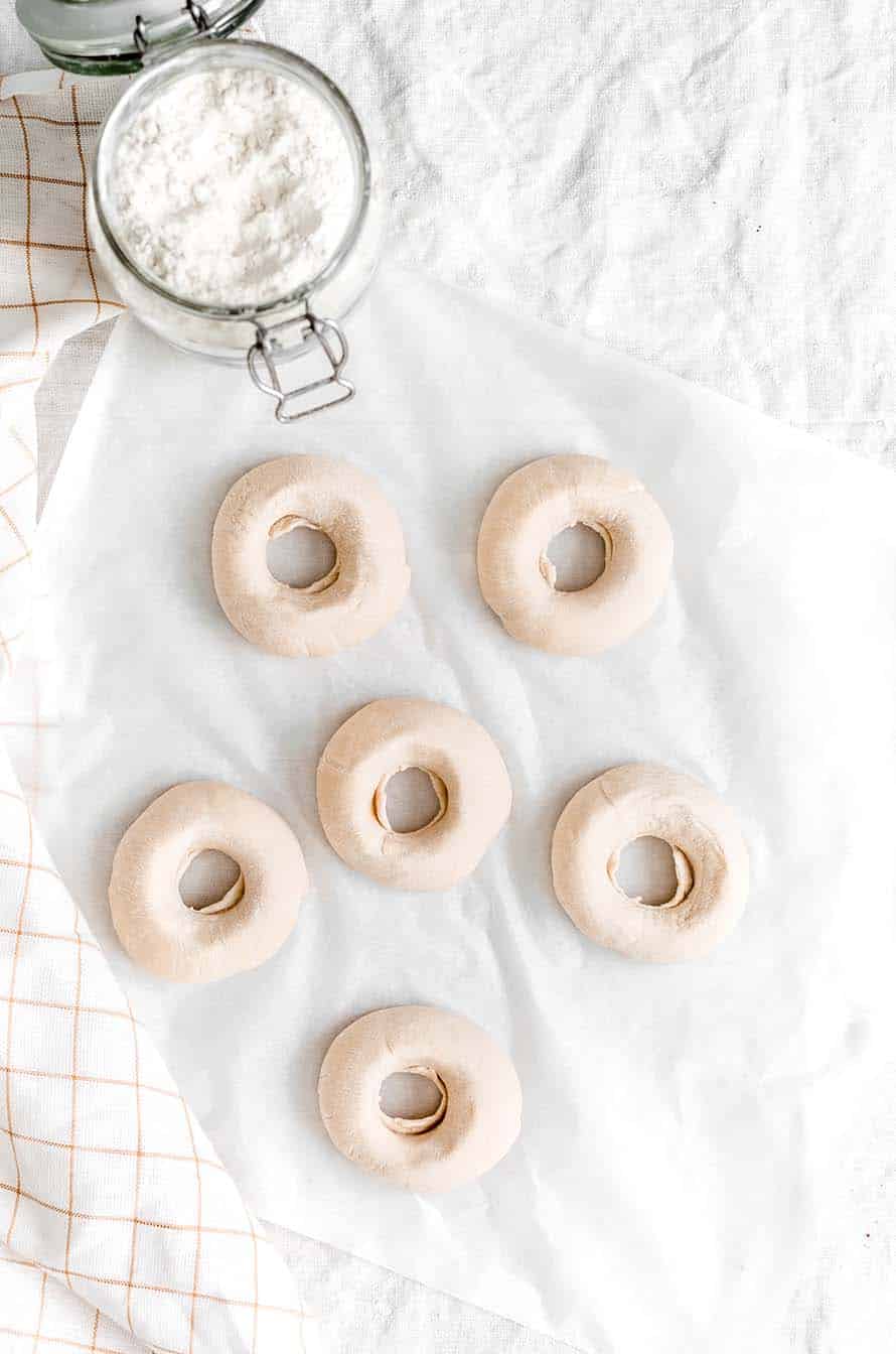 shaped bagels before baking