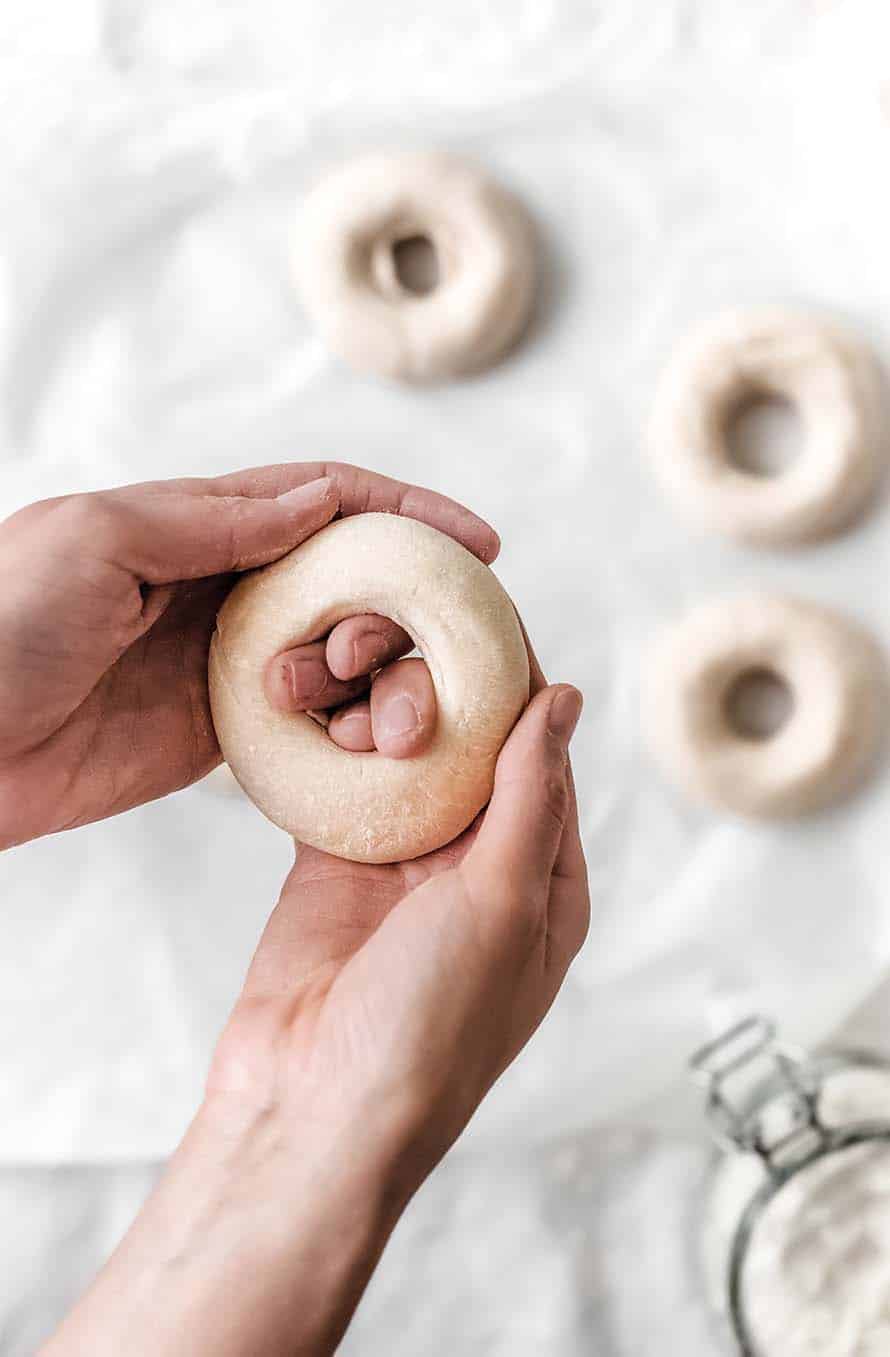 shape bagel on a hand