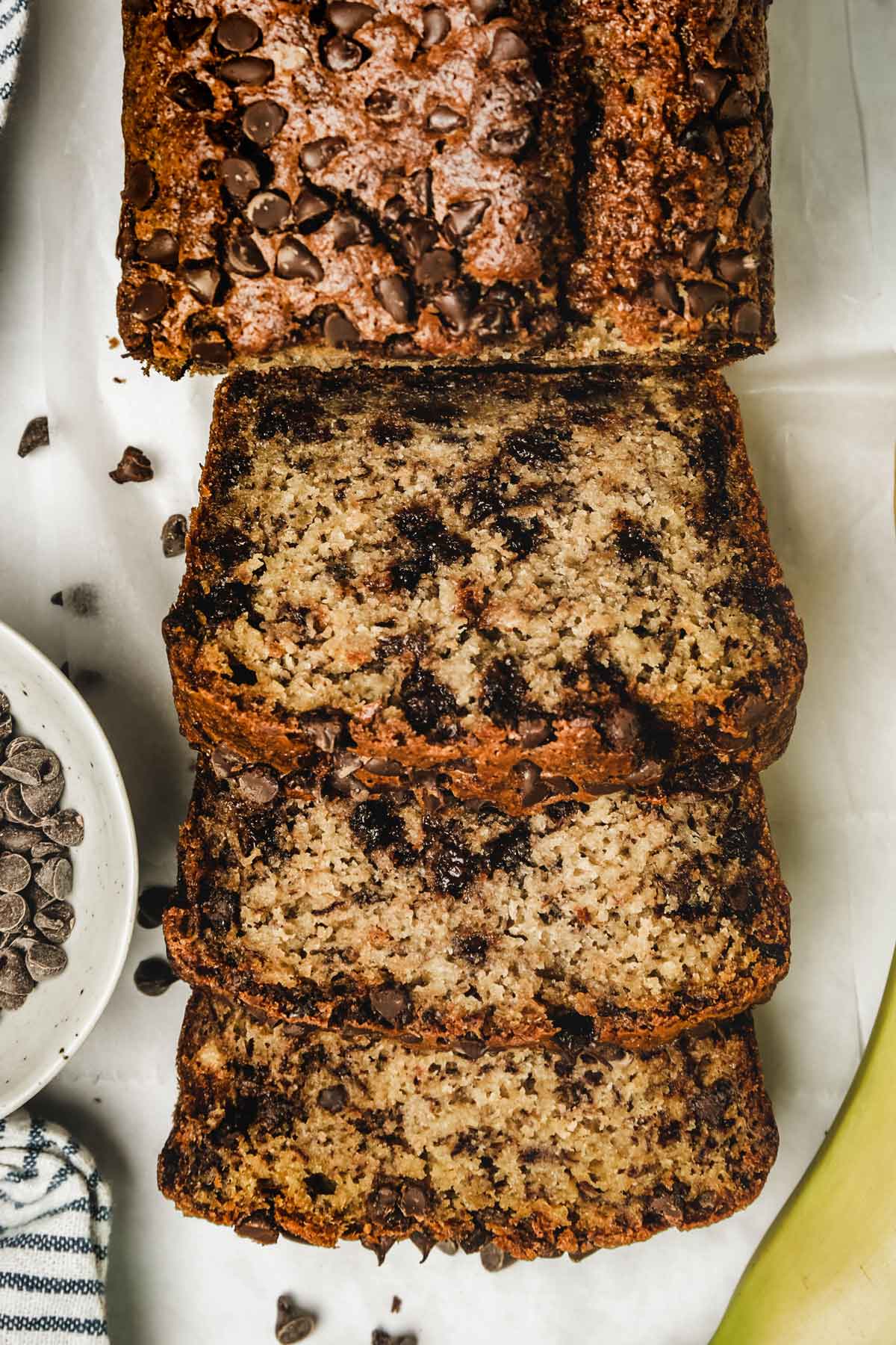 Banana bread cut into slices on a table