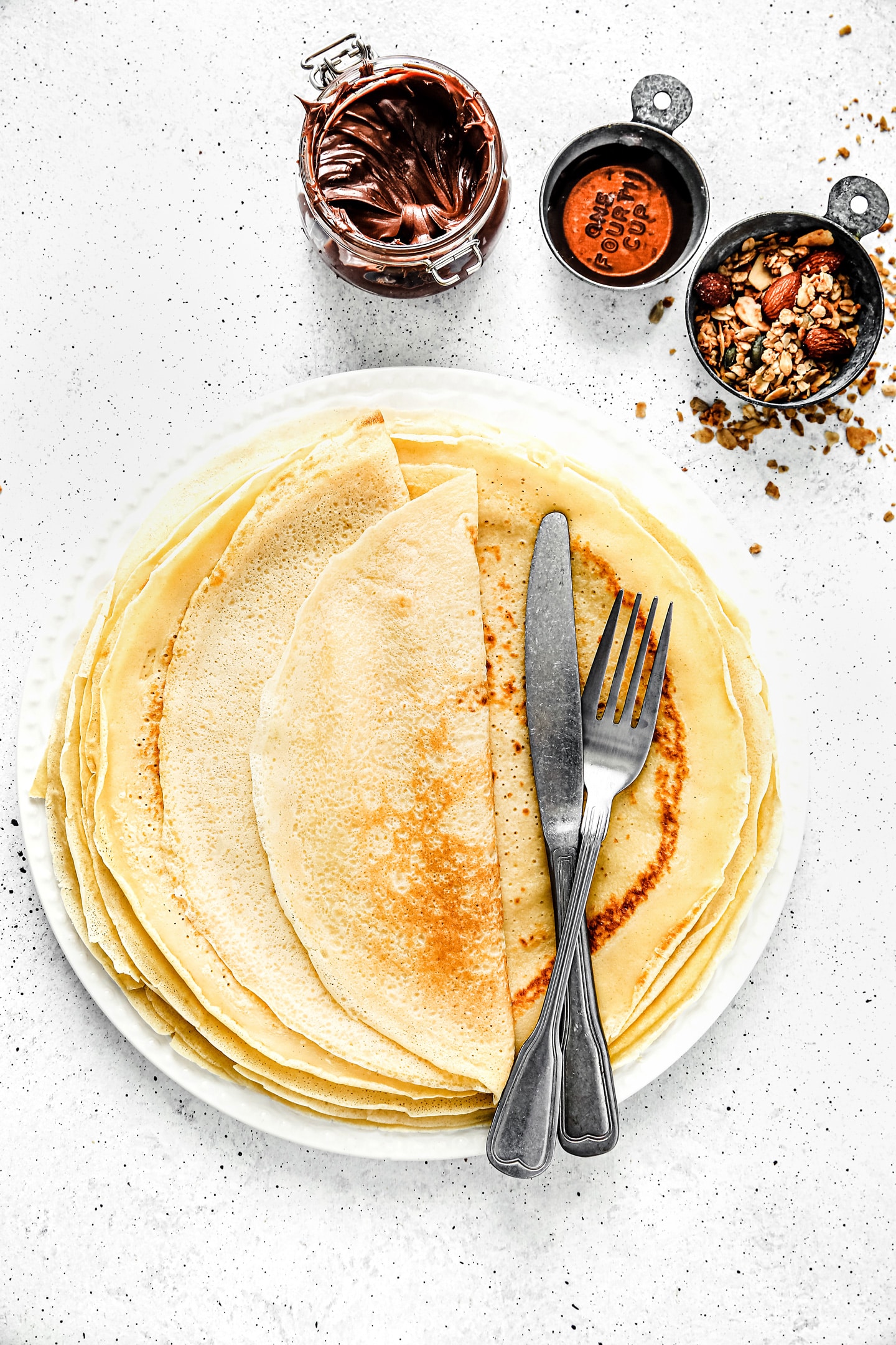 Plate with crepes and fork