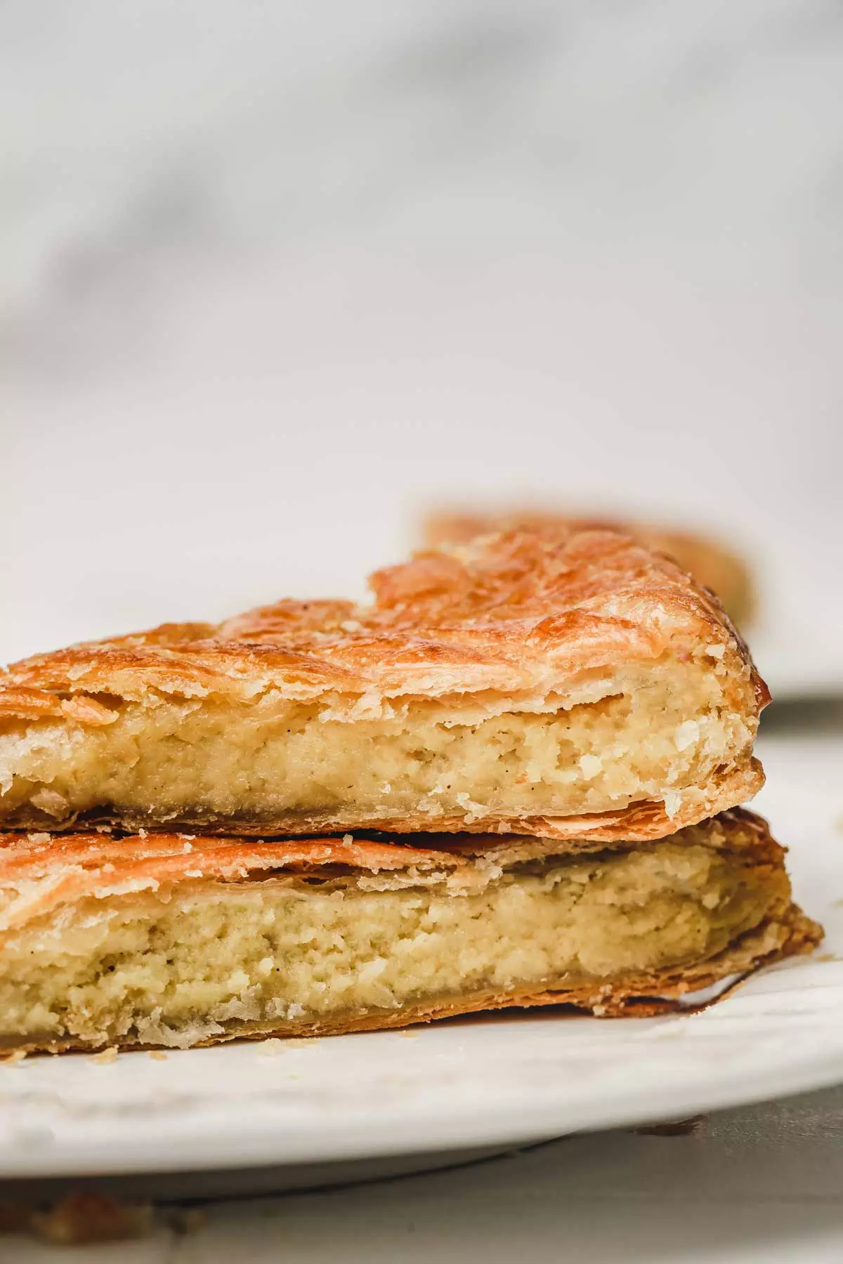 2 slices of almond galette des rois on a plate