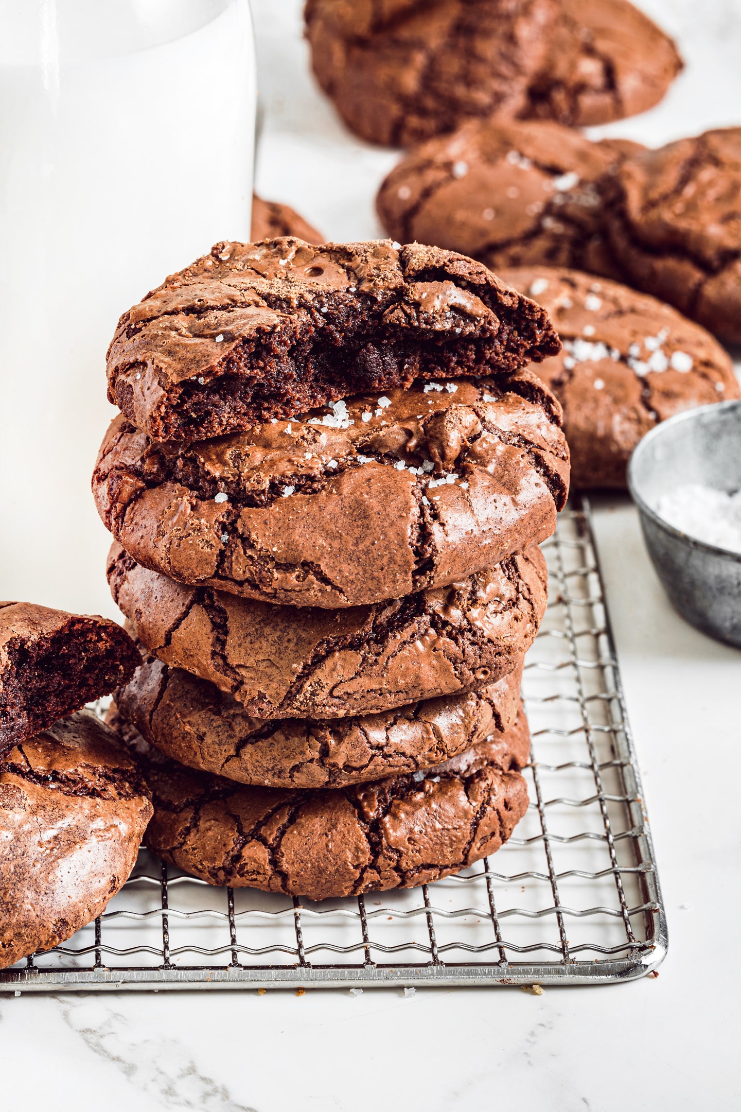 brownie crinkle cookies stacked with crackly tops