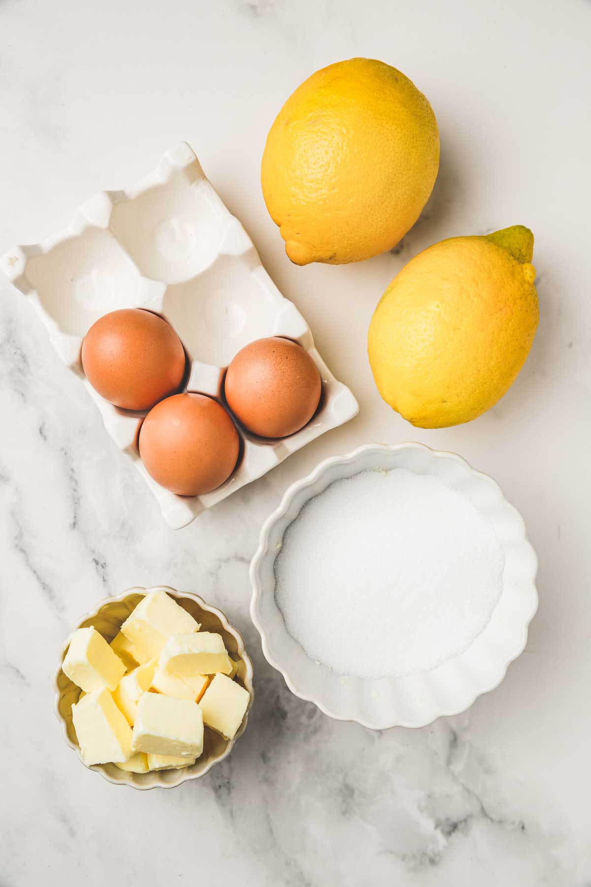 ingredients on a work surface for lemon curd filling