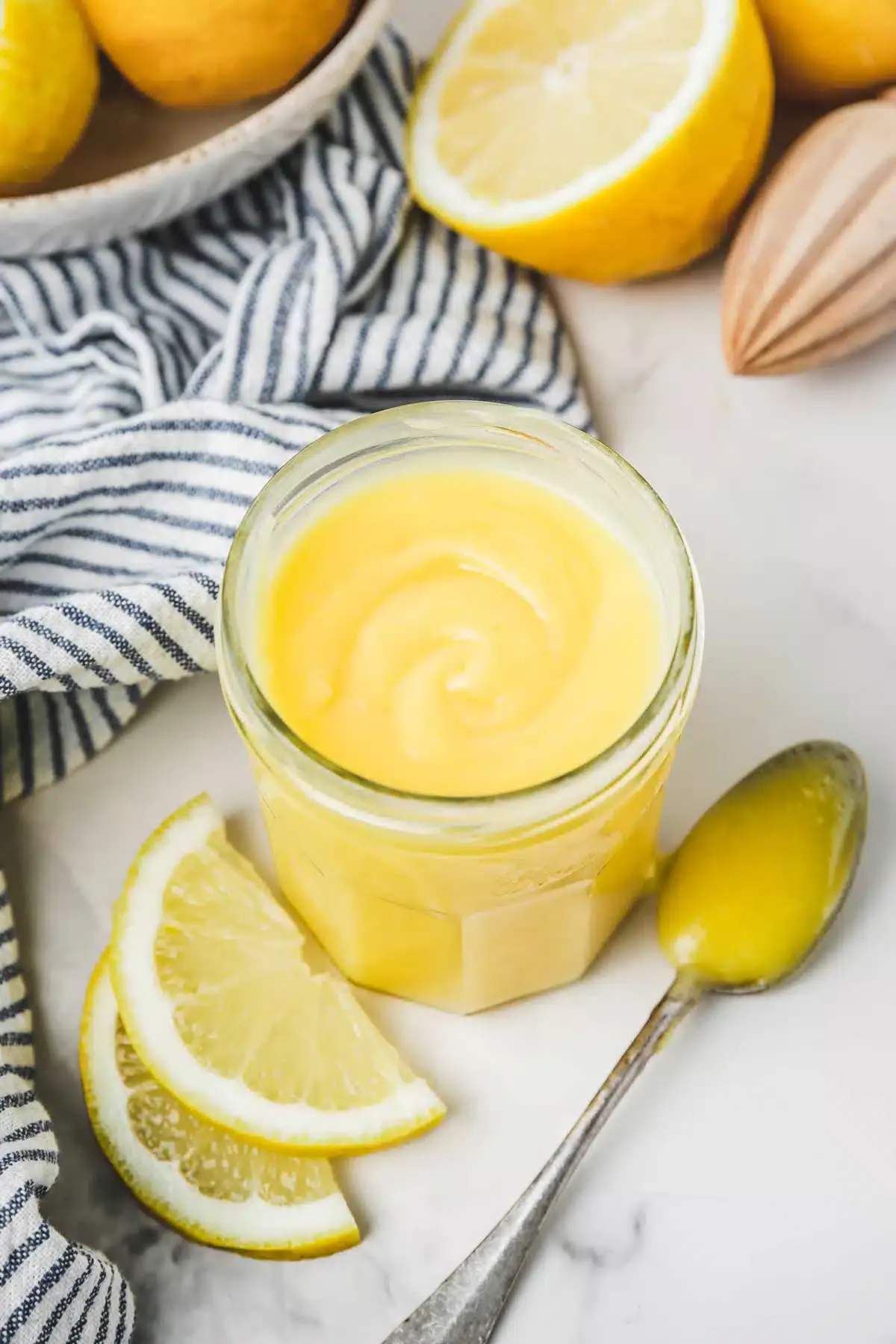 lemon curd in a jar on a table