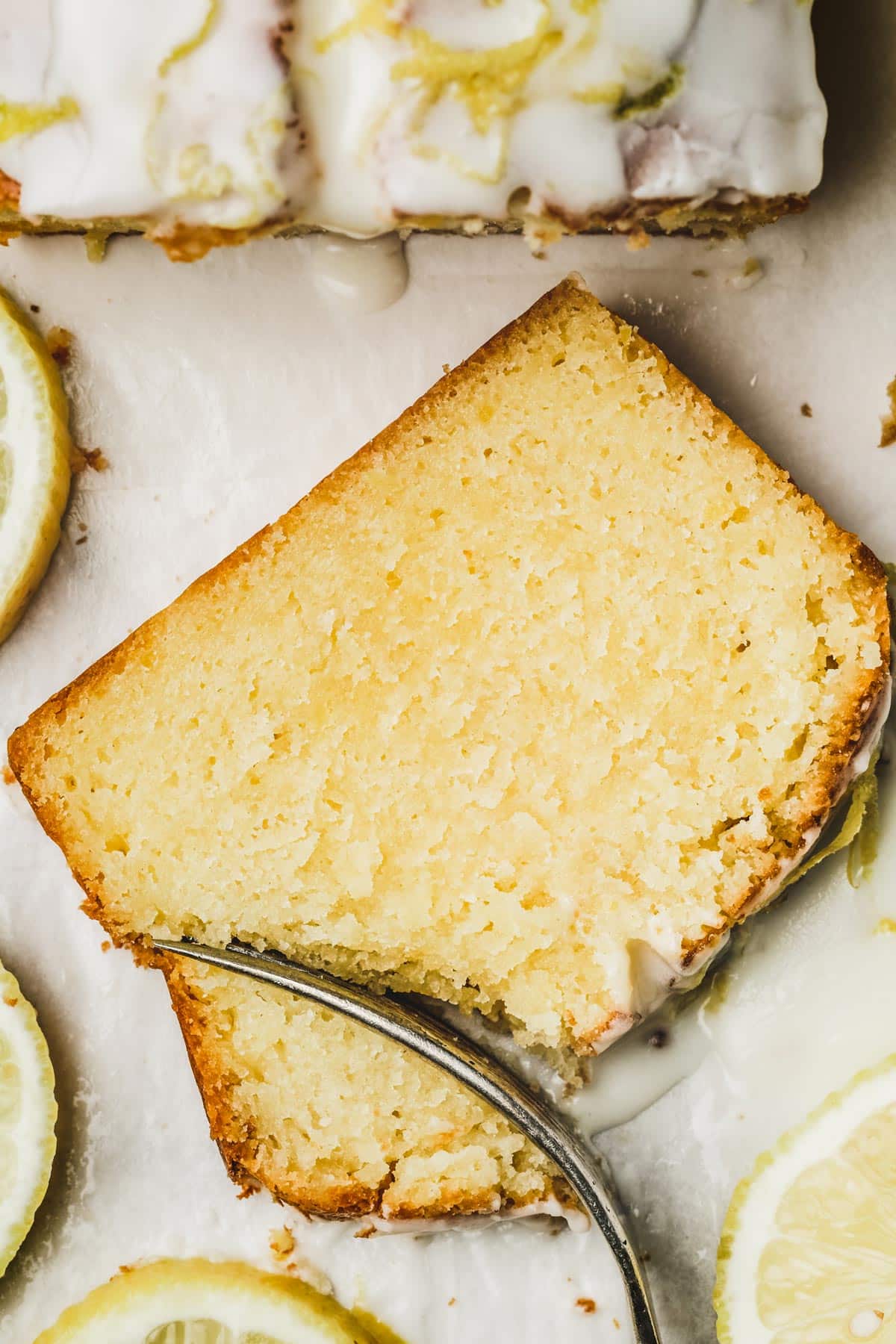 Slice of lemon loaf cake on a table