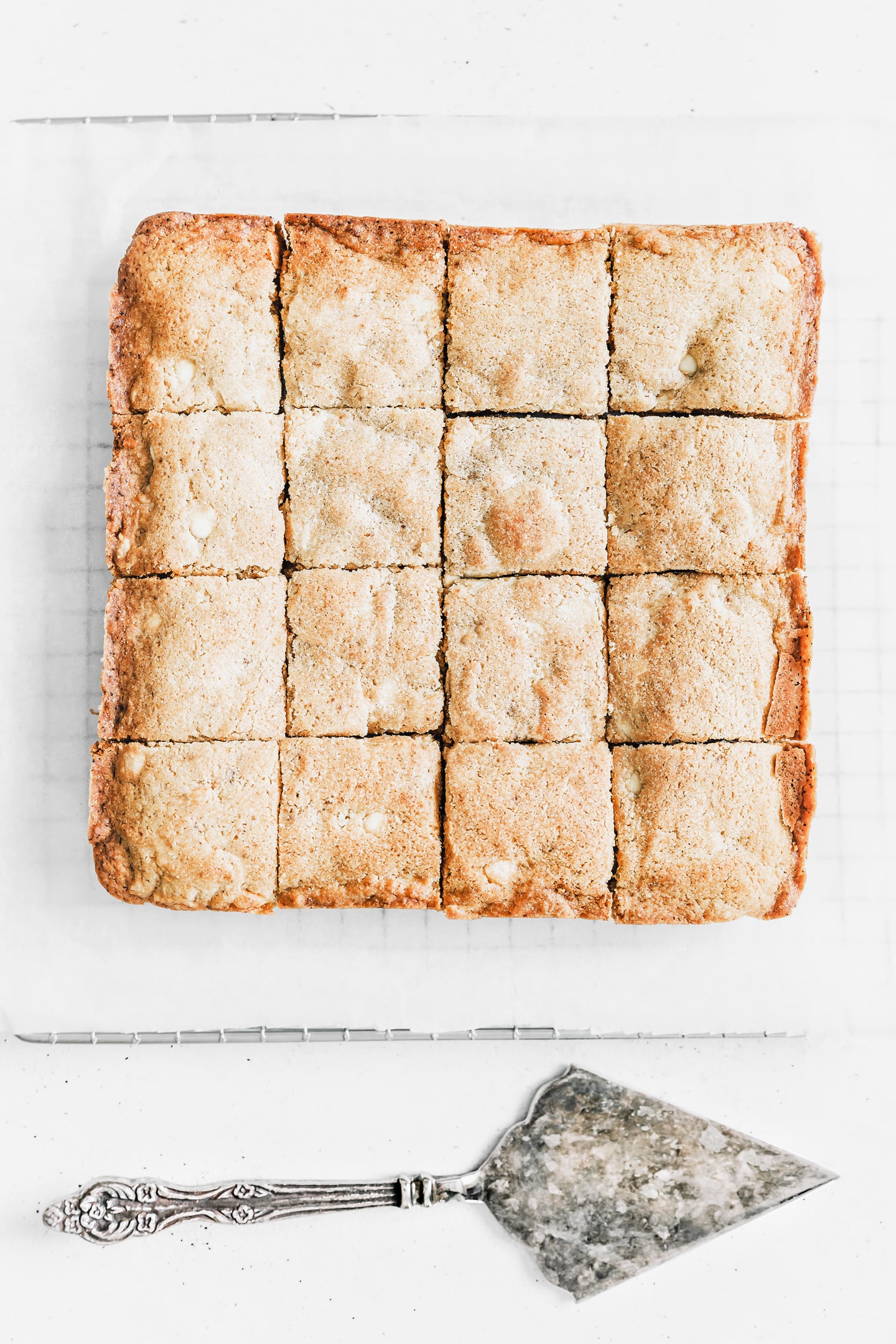 white chocolate brownies on a parchment paper