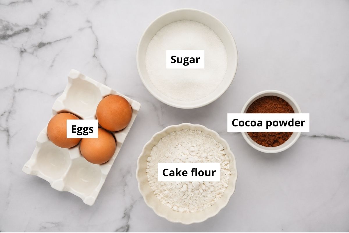 Whipped eggs and sugar with flour and cocoa powder for chocolate genoise