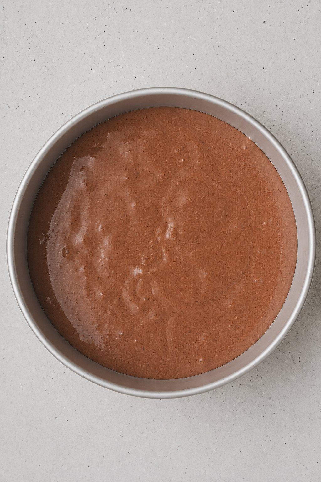 Chocolate genoise sponge cake sliced into layers