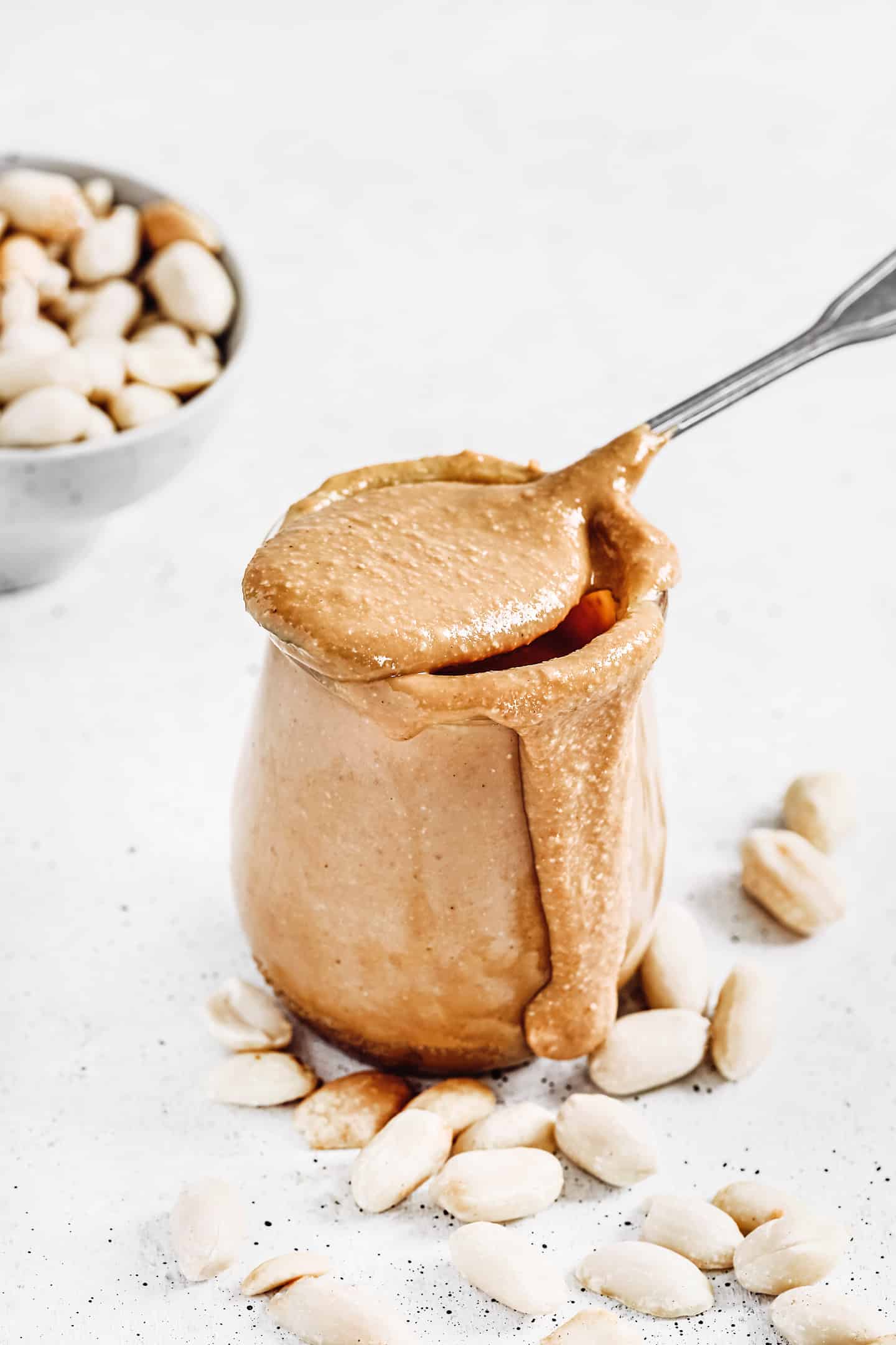 jar with peanut butter and spoon