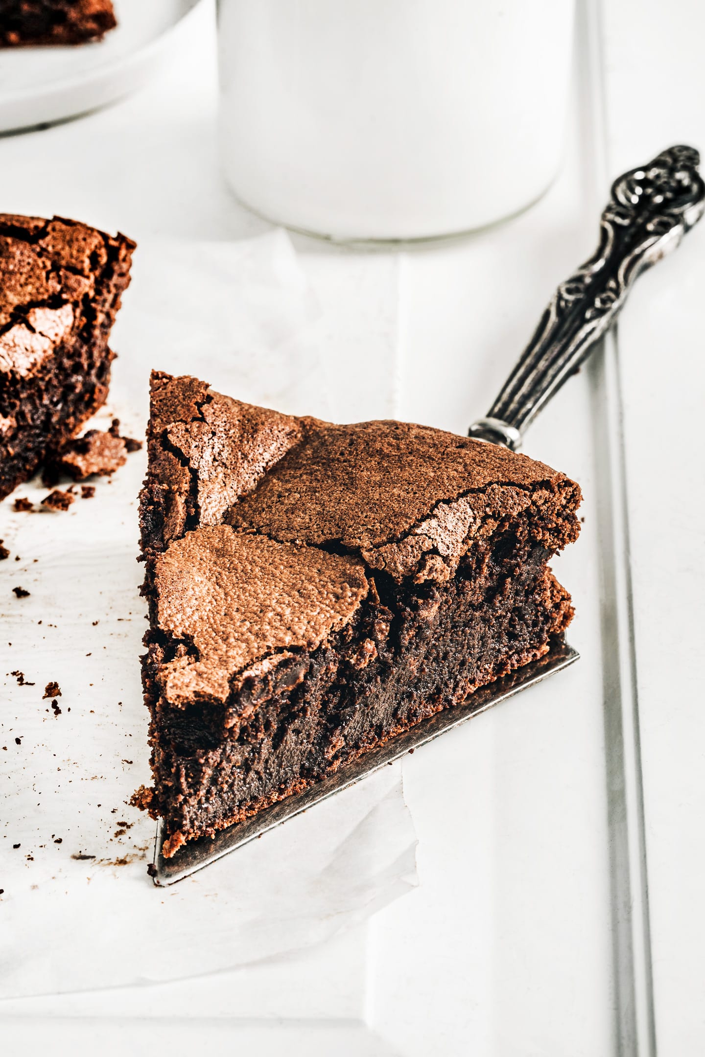 Slice of flourless chocolate cloud cake recipe on a table