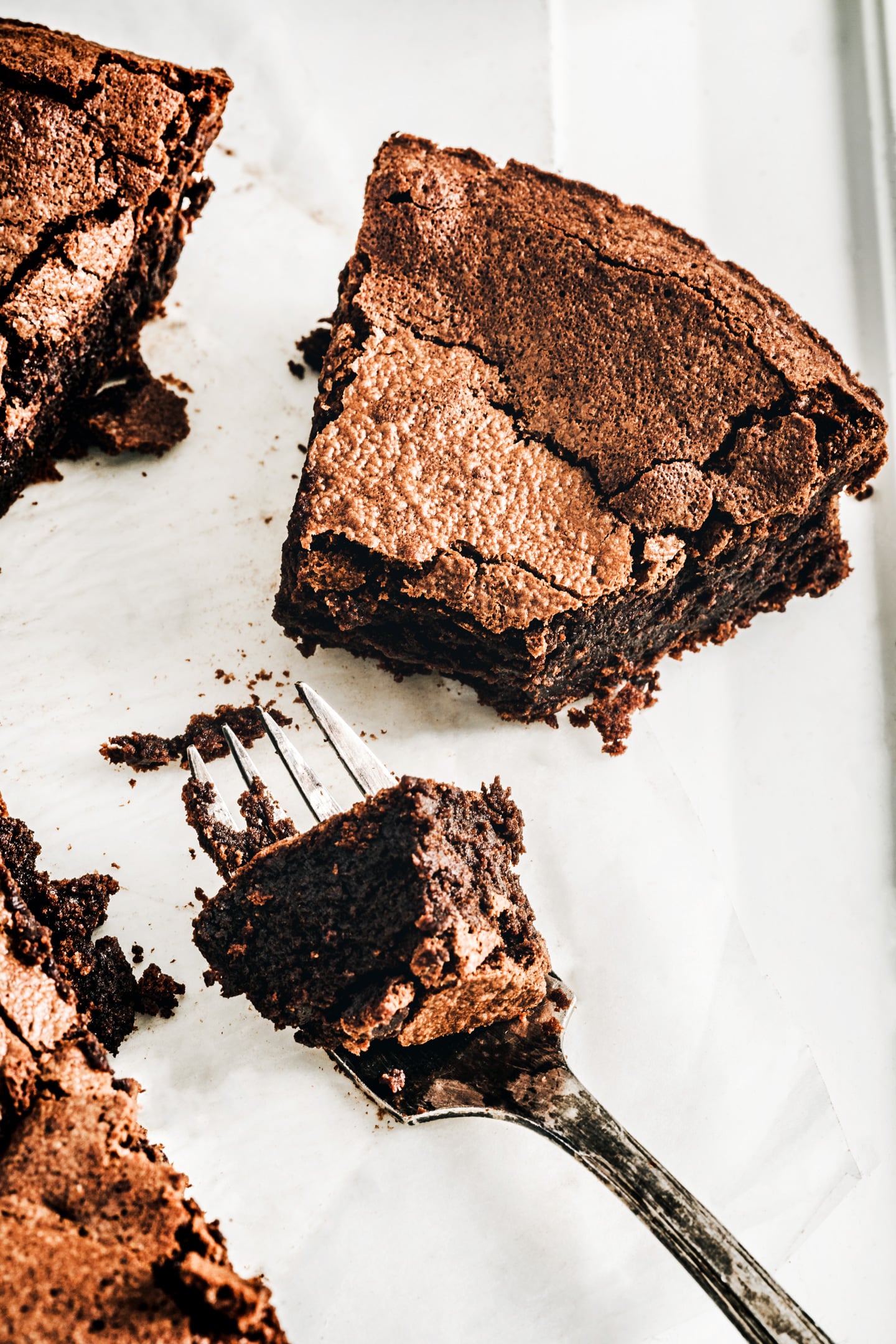 Flourless chocolate cloud cake slice with a fork