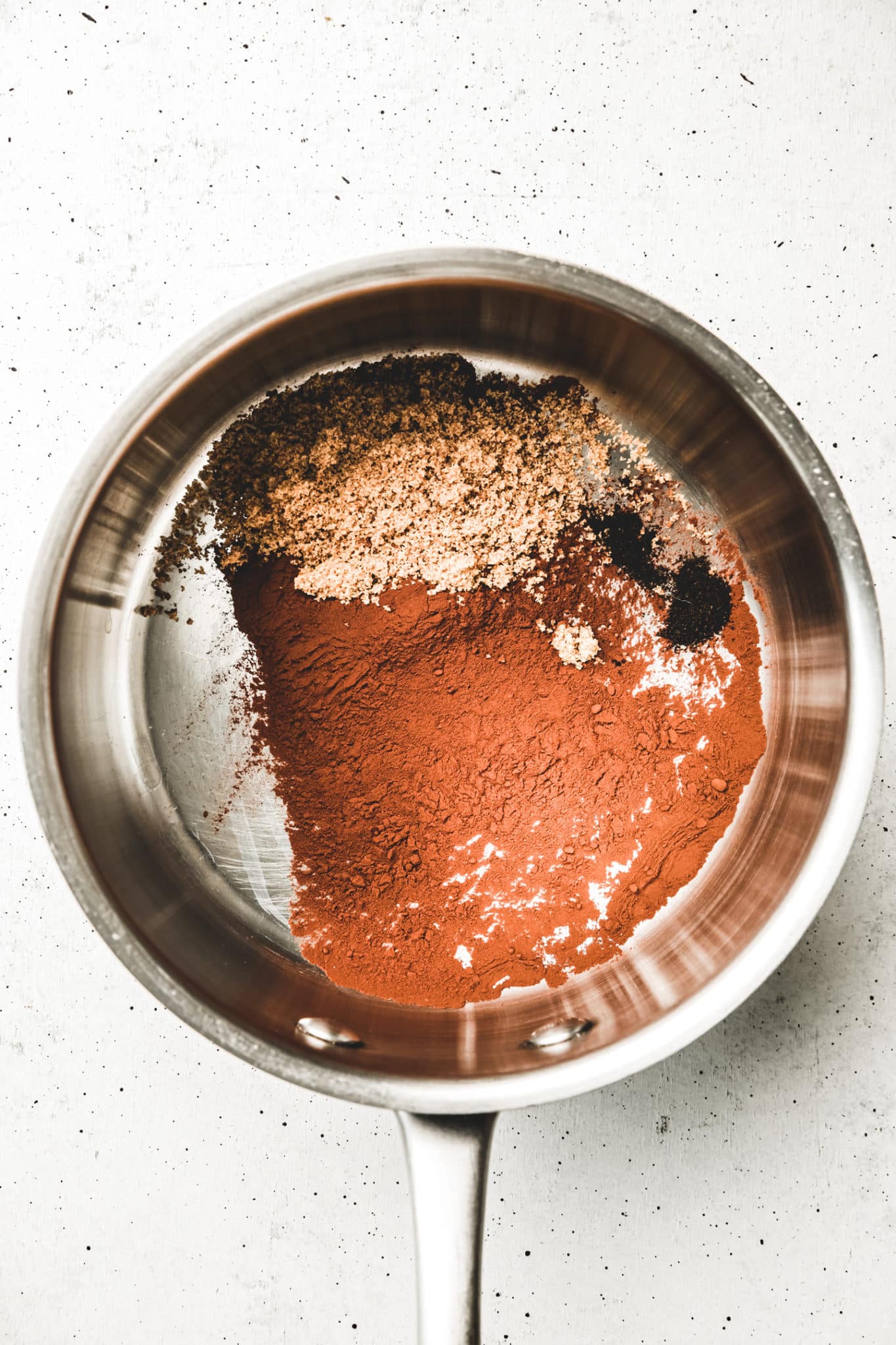 Saucepan with chocolate powder ingredients