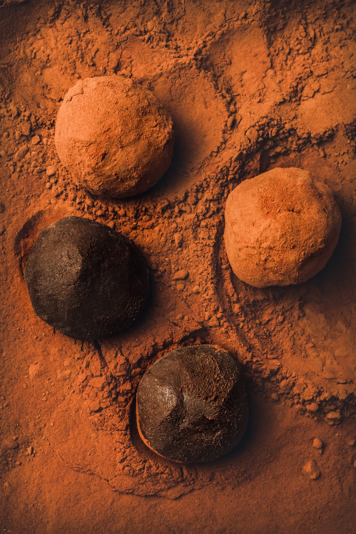 Dark chocolate truffles rolled in unsweetened cocoa powder