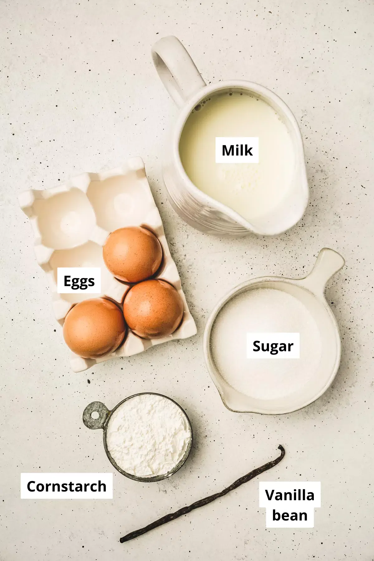 bowls with ingredients for a vanilla pastry cream