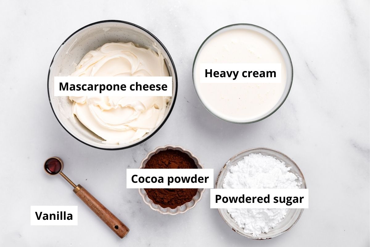 ingredients for chocolate mascarpone whipped frosting in bowls