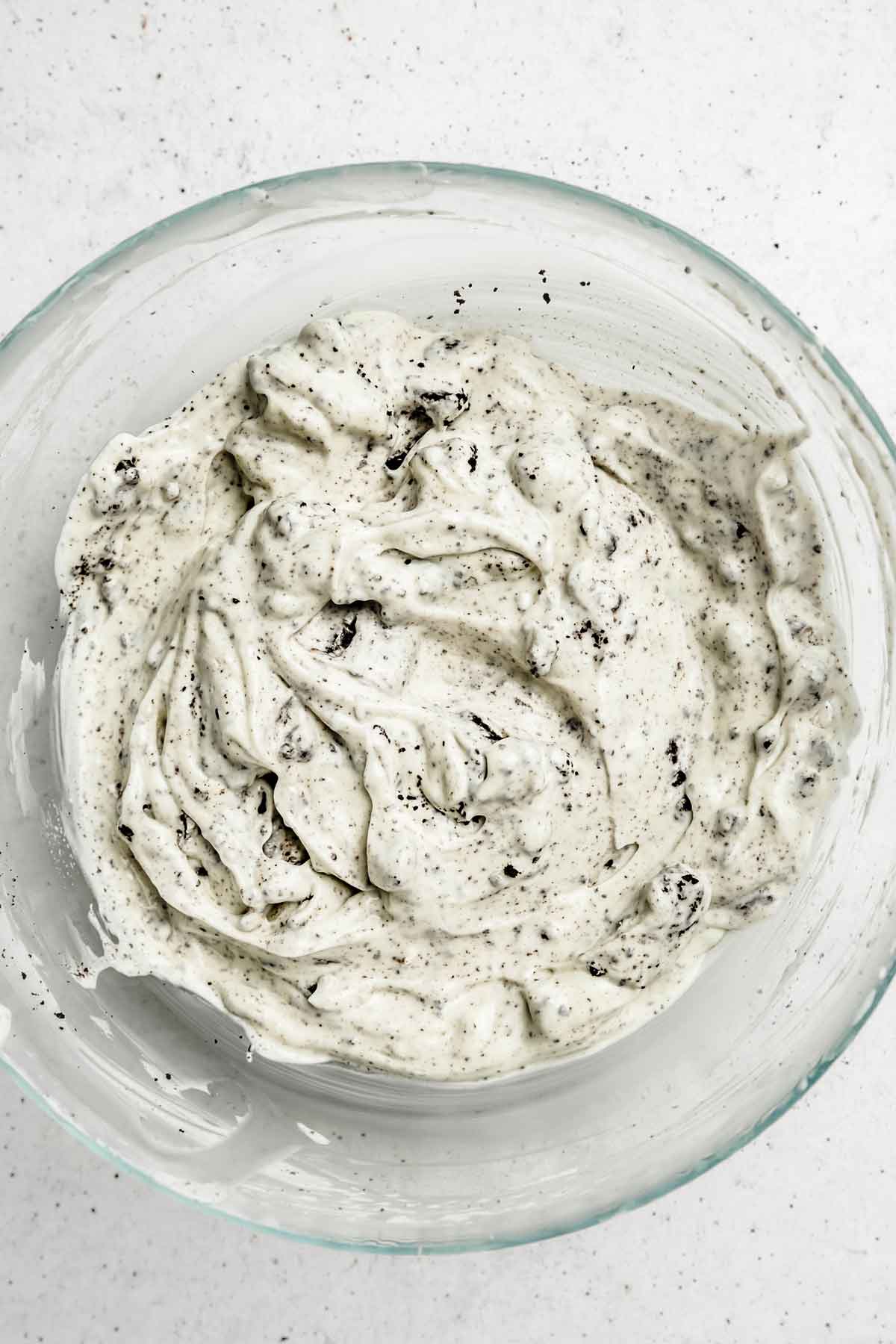 large mixing bowl with oreo cream cheese filling