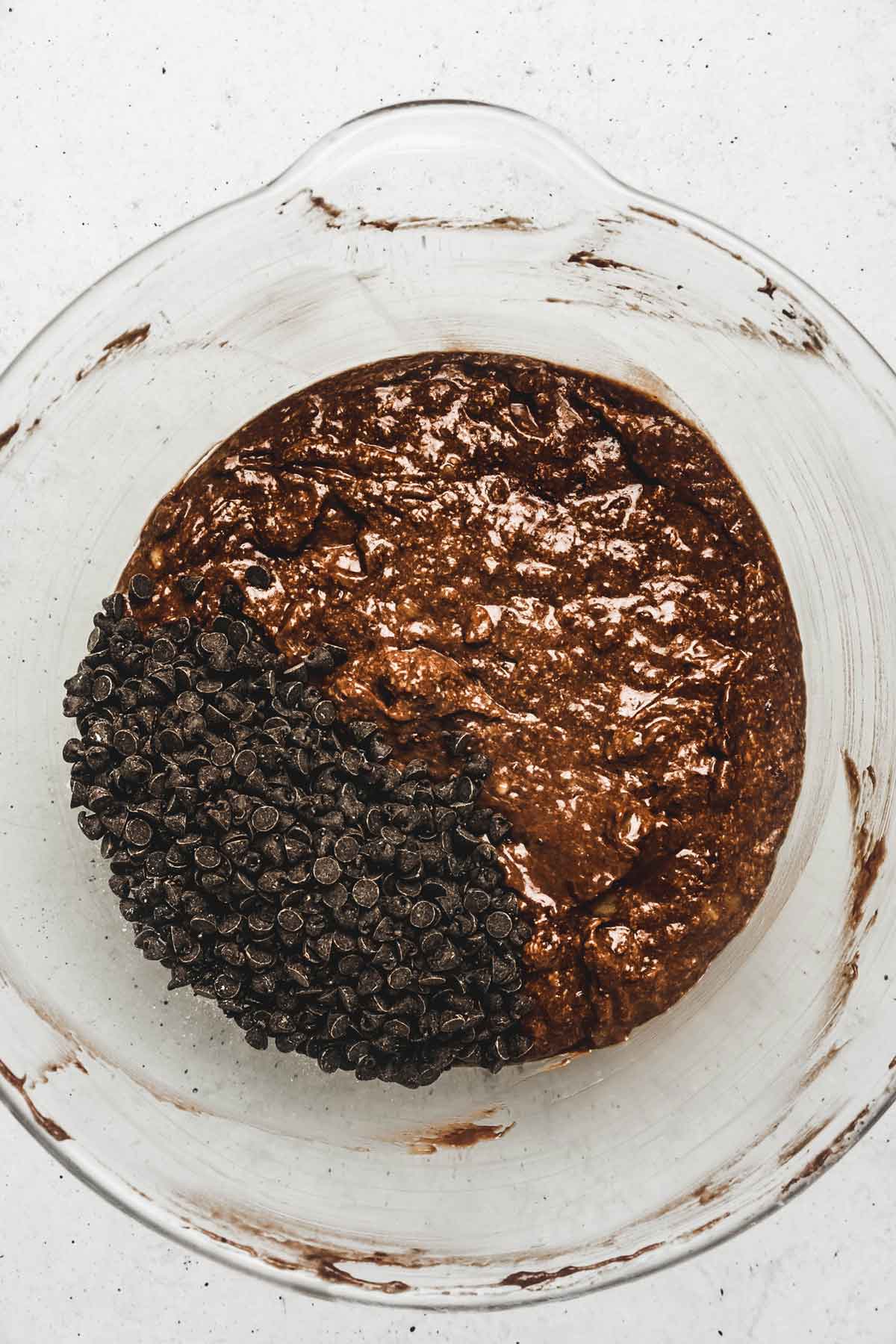 Large bowl with chocolate banana bread batter and chocolate chips