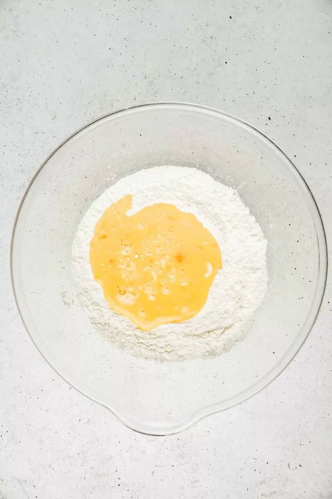 Bowl with crepe batter ingredients