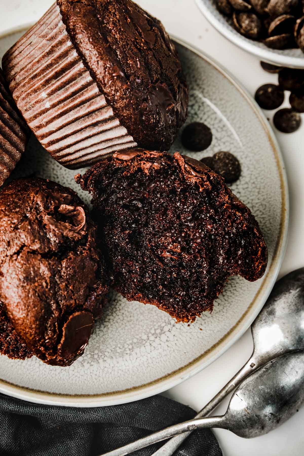 Chocolate muffin cut in 2 on a plate