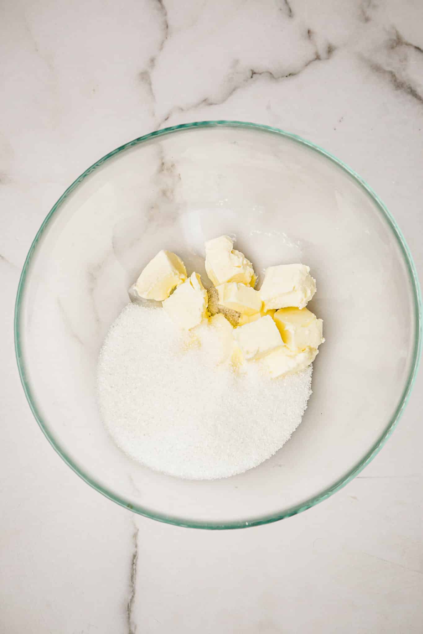 Bowl with granulated sugar and butter