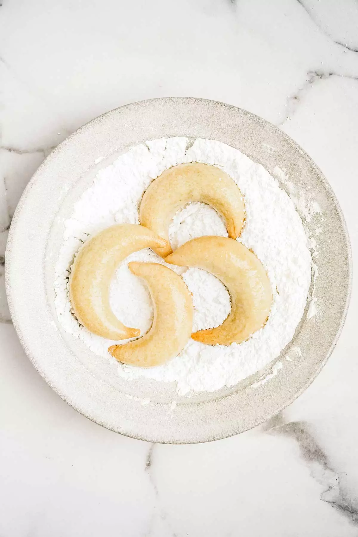 gazelle horns in a plat of powdered sugar