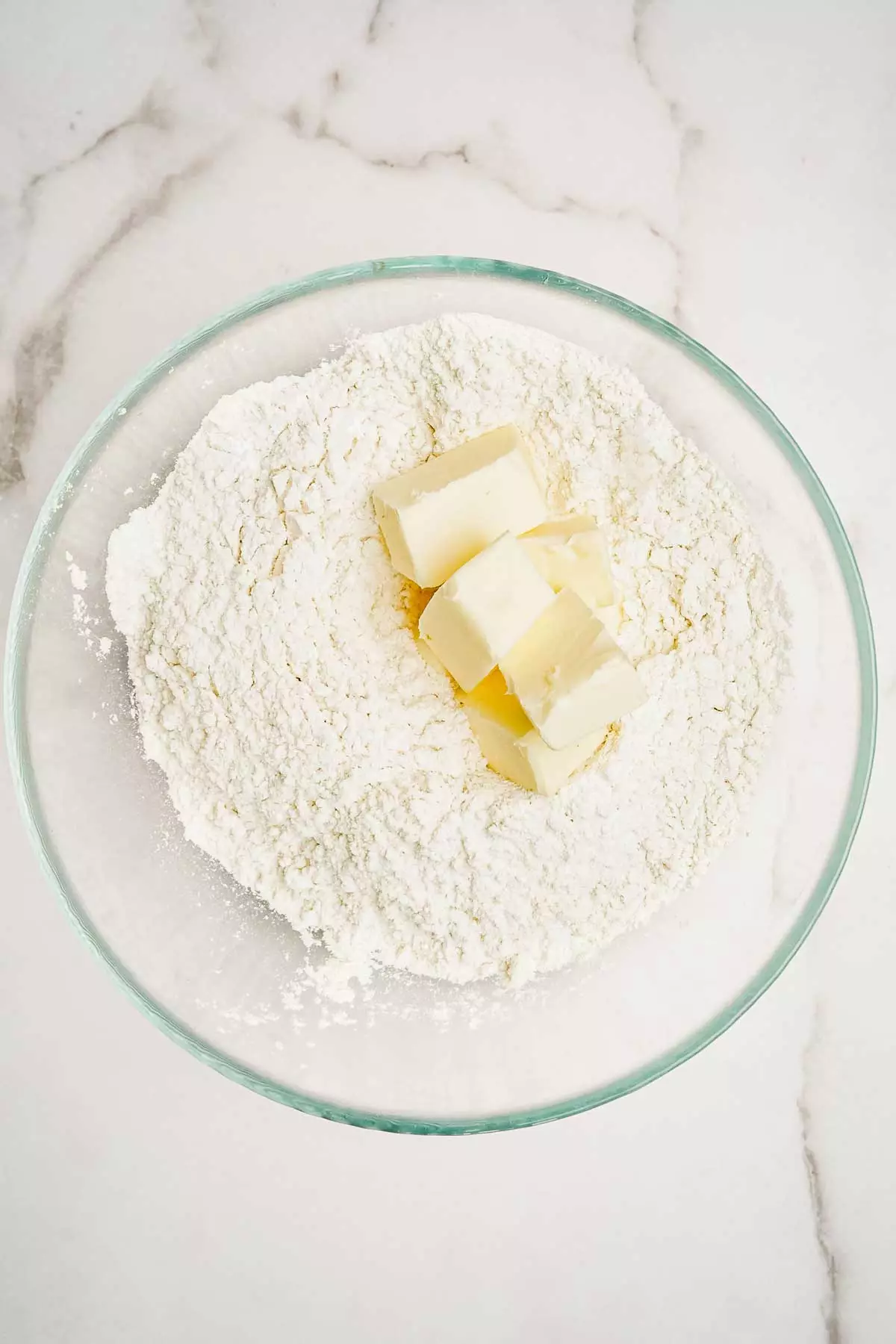 medium bowl with butter and flour