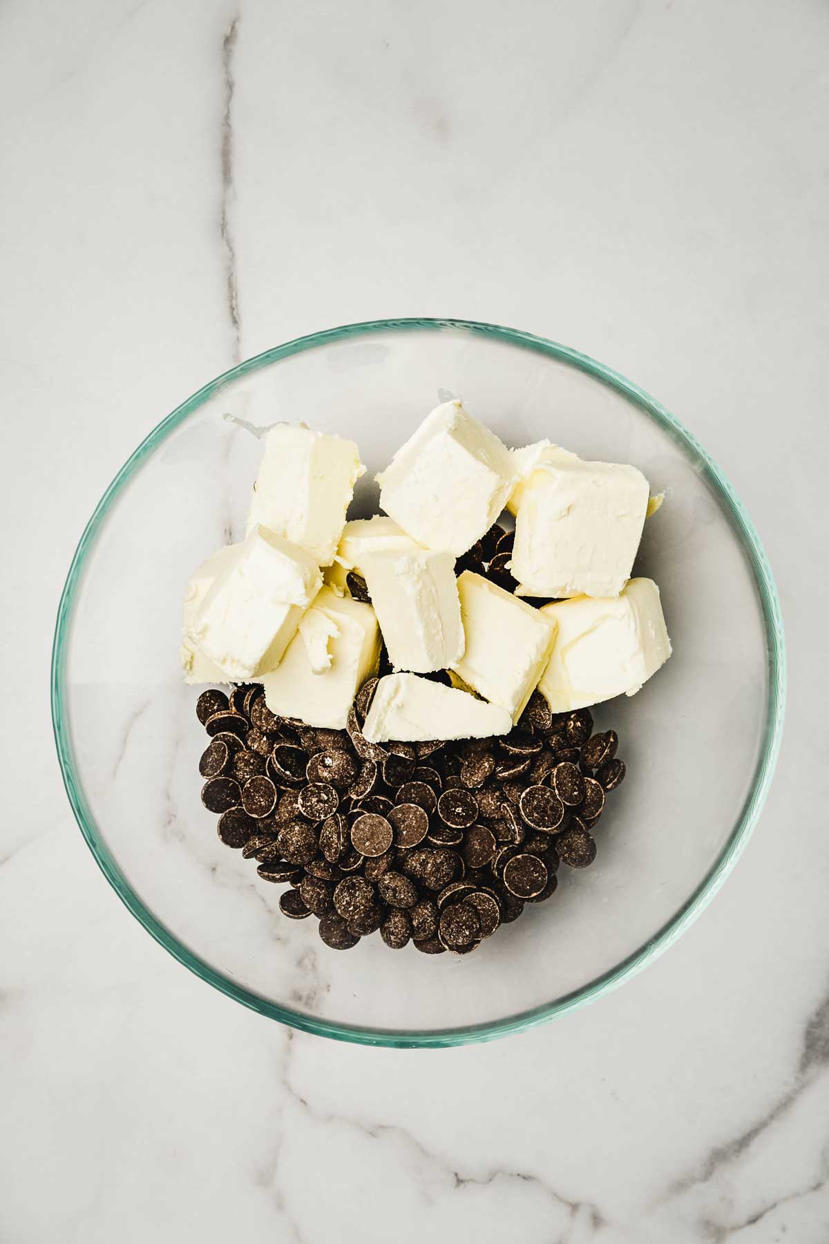 Bowl with chocolate chips and butter